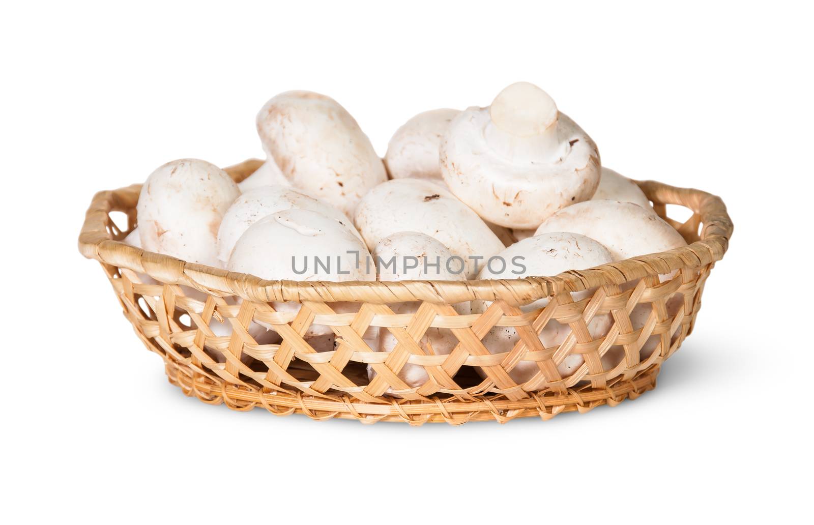 Mushrooms Champignon In A Wicker Basket Isolated On White Background