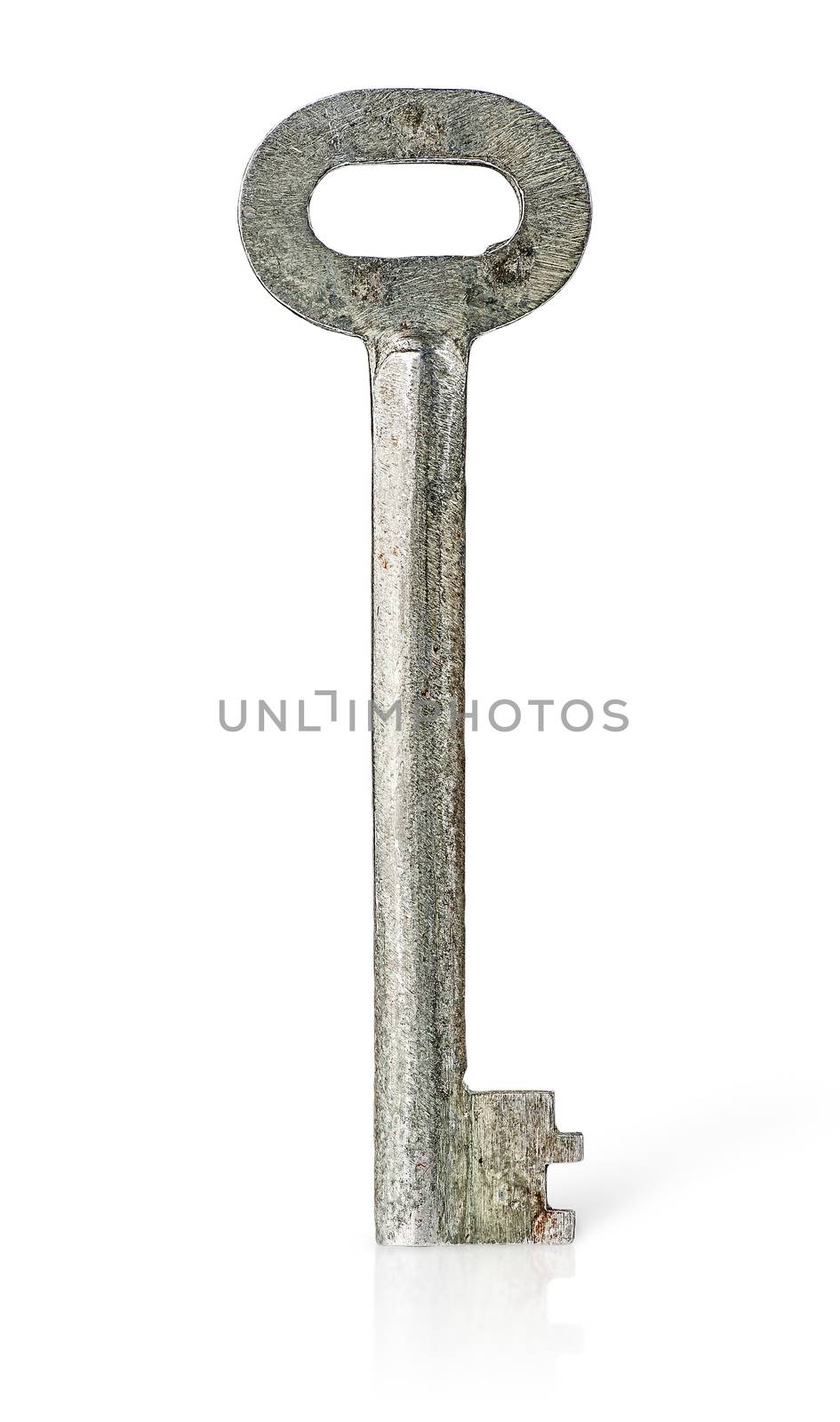 Old rusty big key vertically isolated on white background