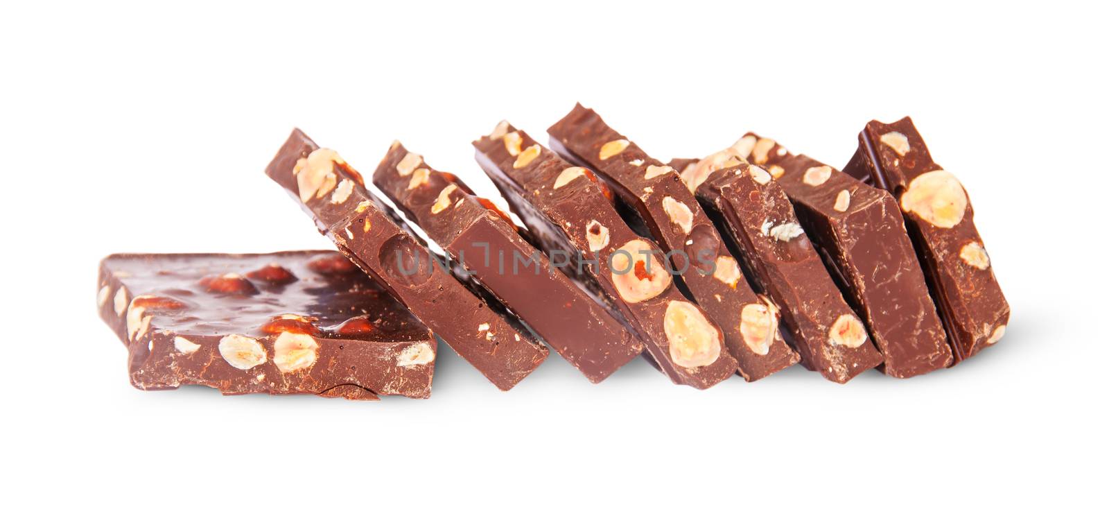 Pieces of dark chocolate stacked stairs isolated on white background