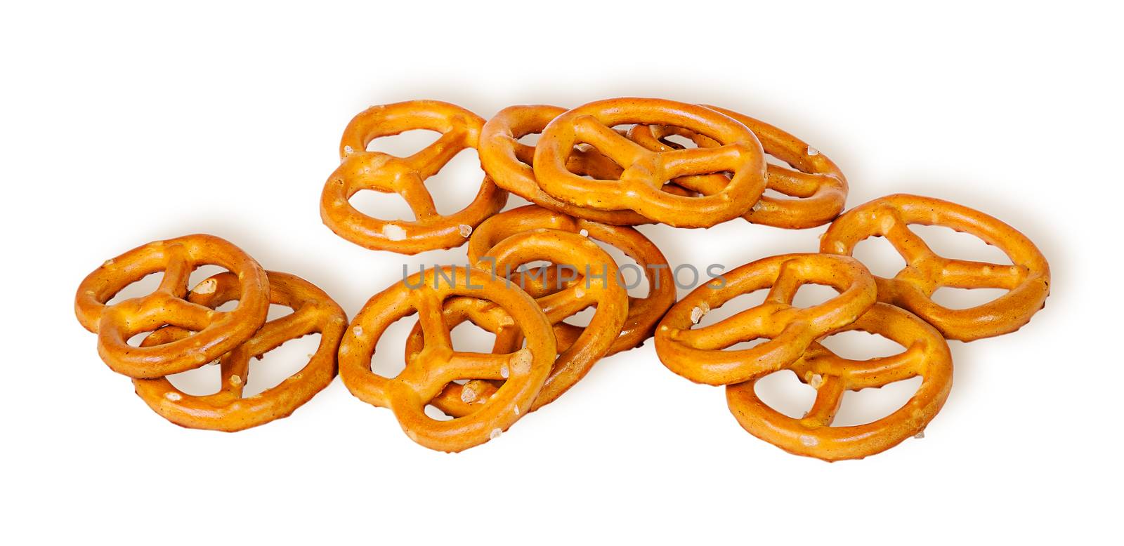 Pile crunchy pretzels with salt isolated on white background