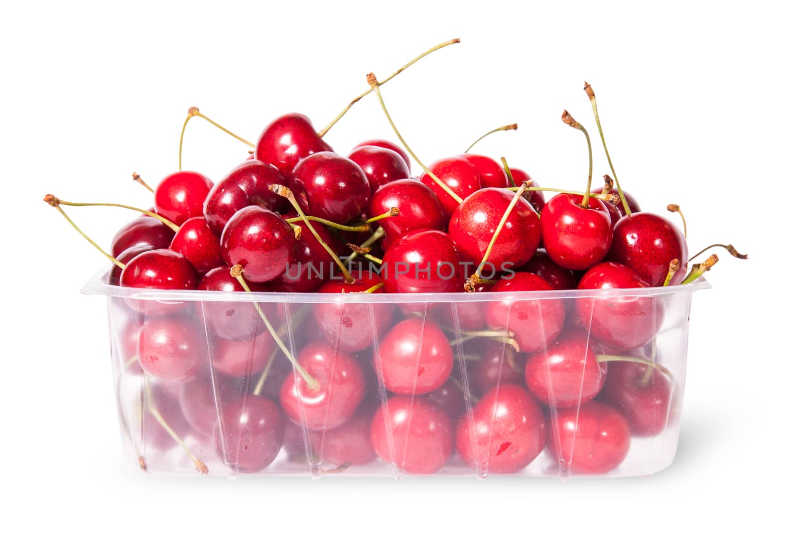 Red juicy sweet cherries in a plastic tray isolated on white background