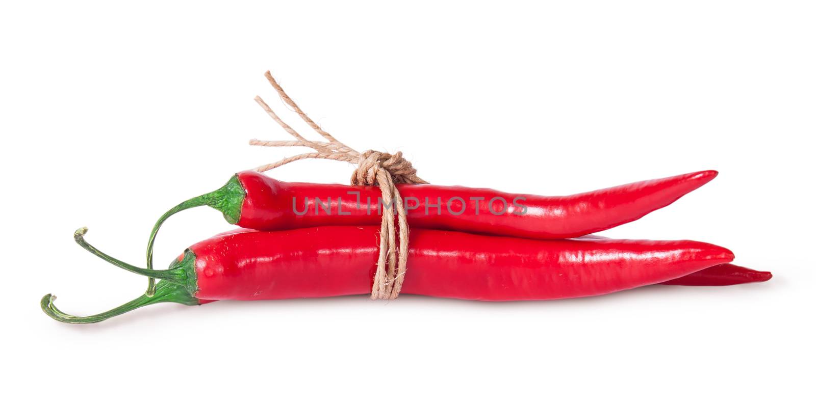 Red chili peppers tied with a rope isolated on white background