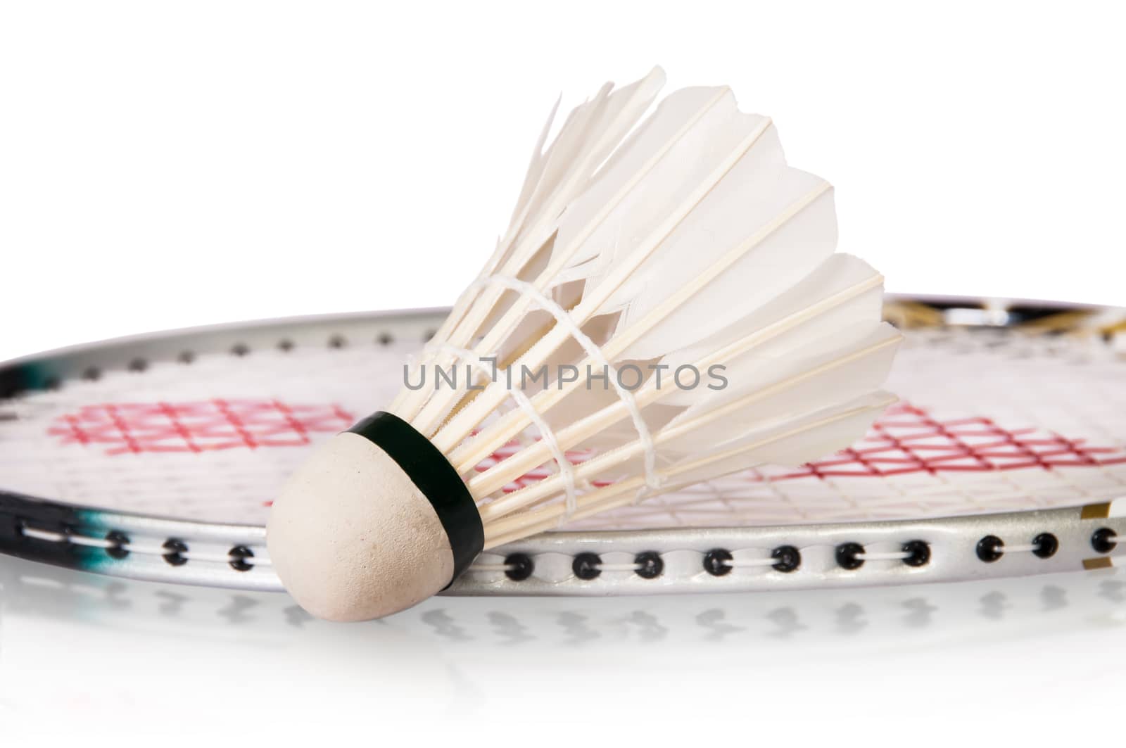 Shuttlecock Near Badminton Racket Isolated On White Background