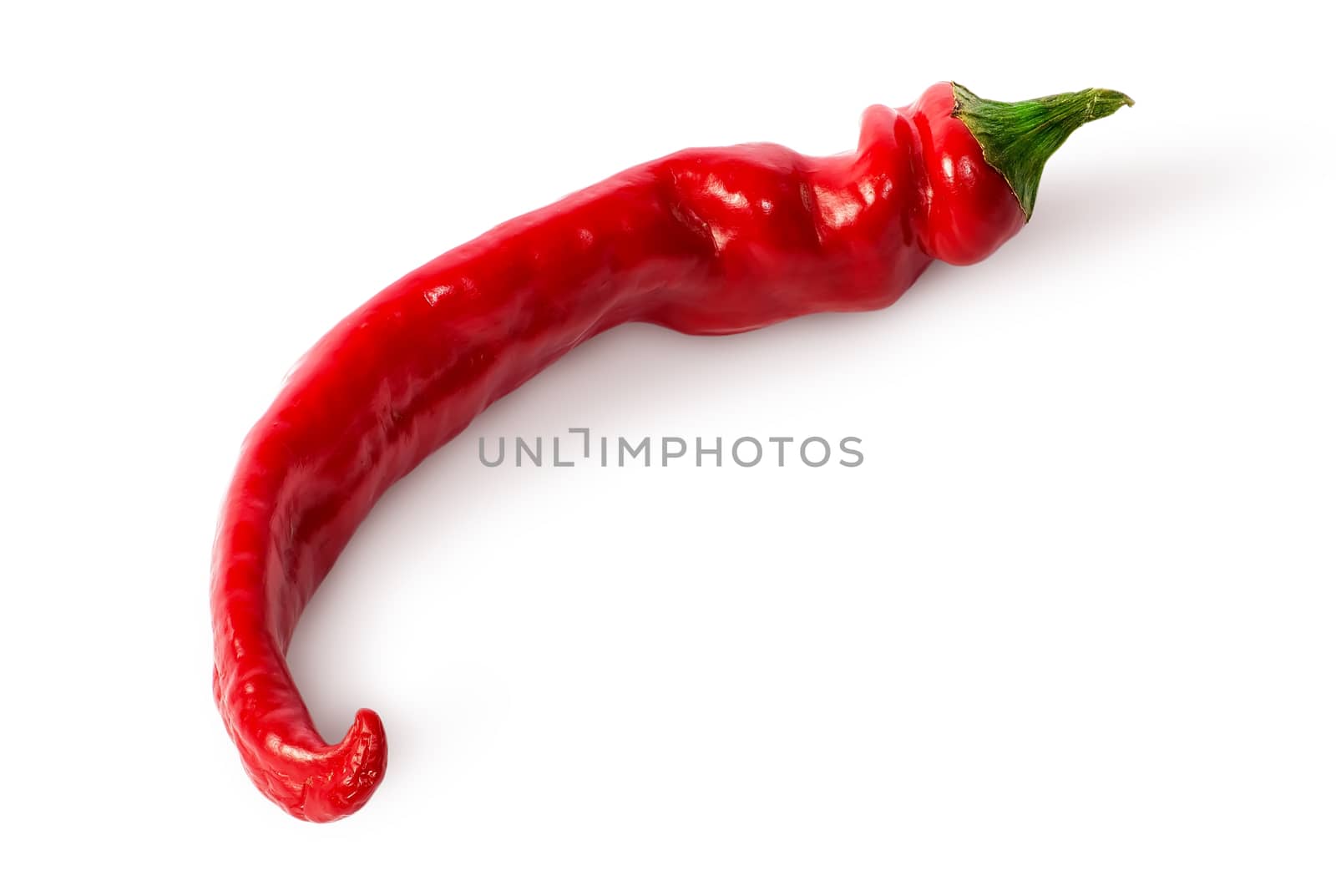 Single curved chili peppers on the side isolated on white background