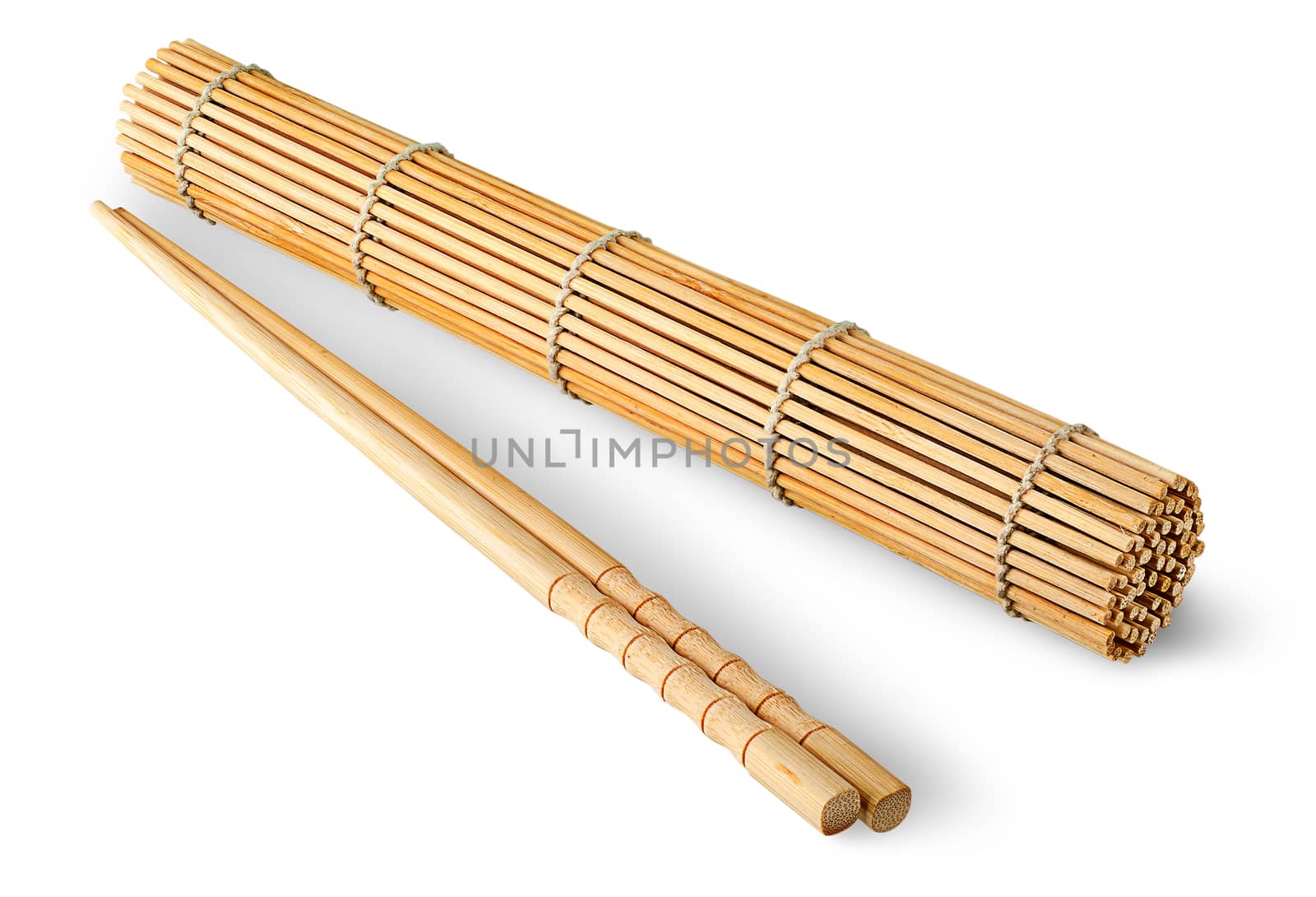 Sushi mat roll up and chopsticks isolated on a white background