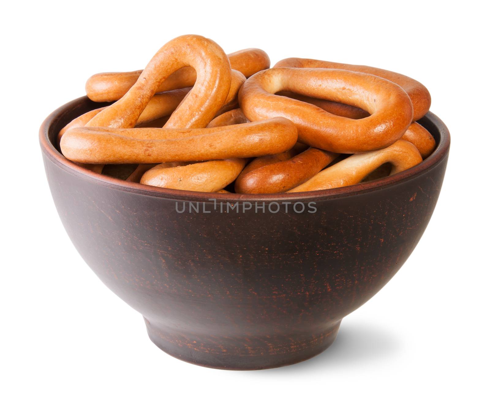 Tasty Oval Bagels Into Ceramic Bowl Isolated On White Background