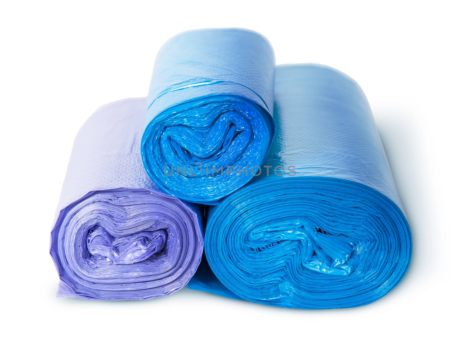 Three rolls of plastic garbage bags isolated on white background