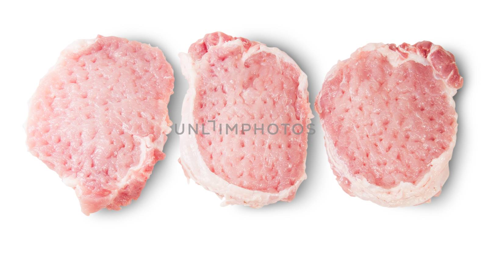 Three Raw Pork Schnitzels Isolated On White Background