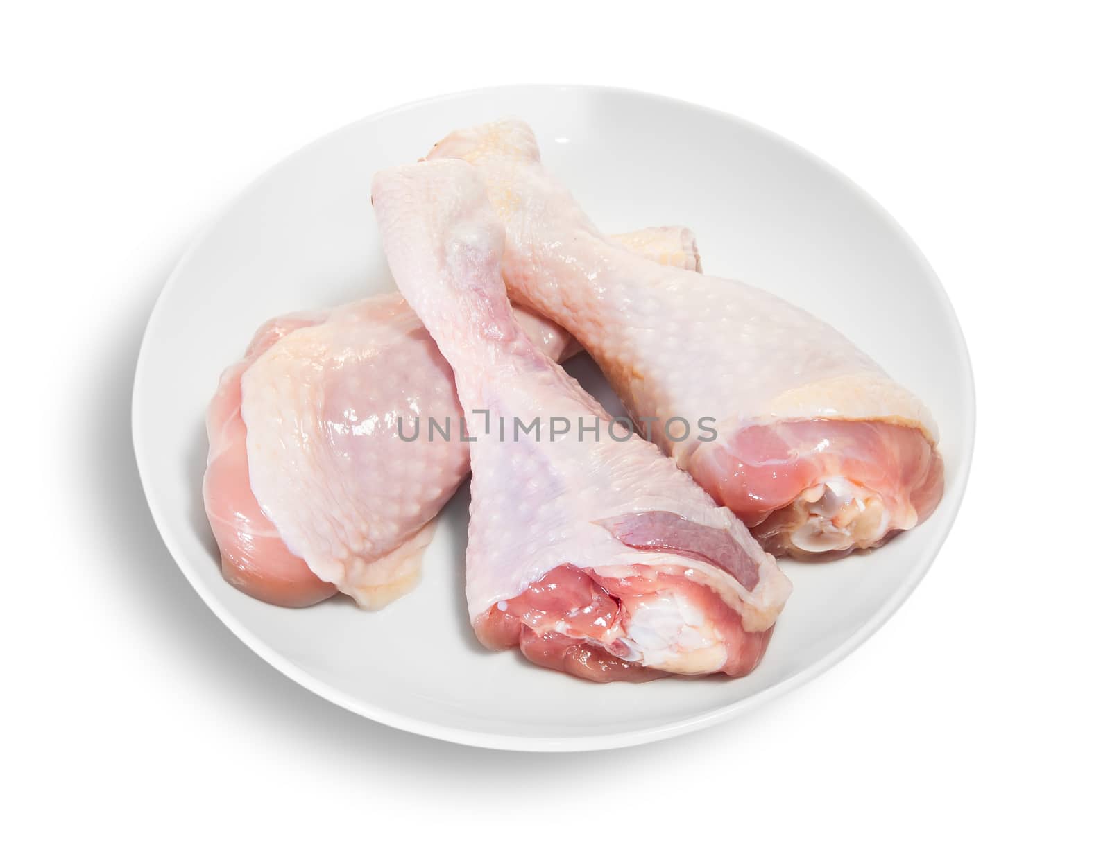 Three Raw Chicken Legs On White Plate by Cipariss