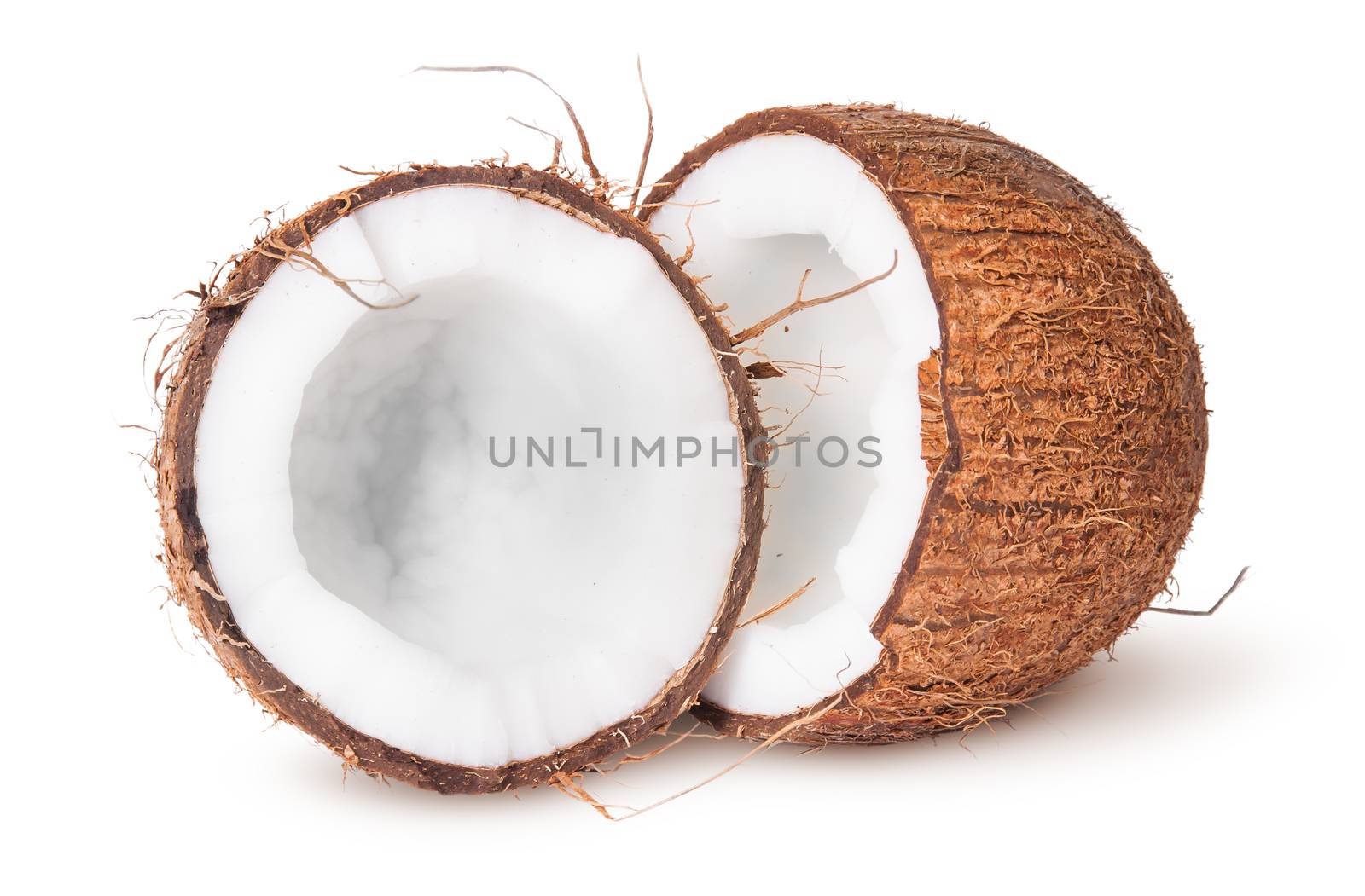 Two halves of coconut isolated on white background