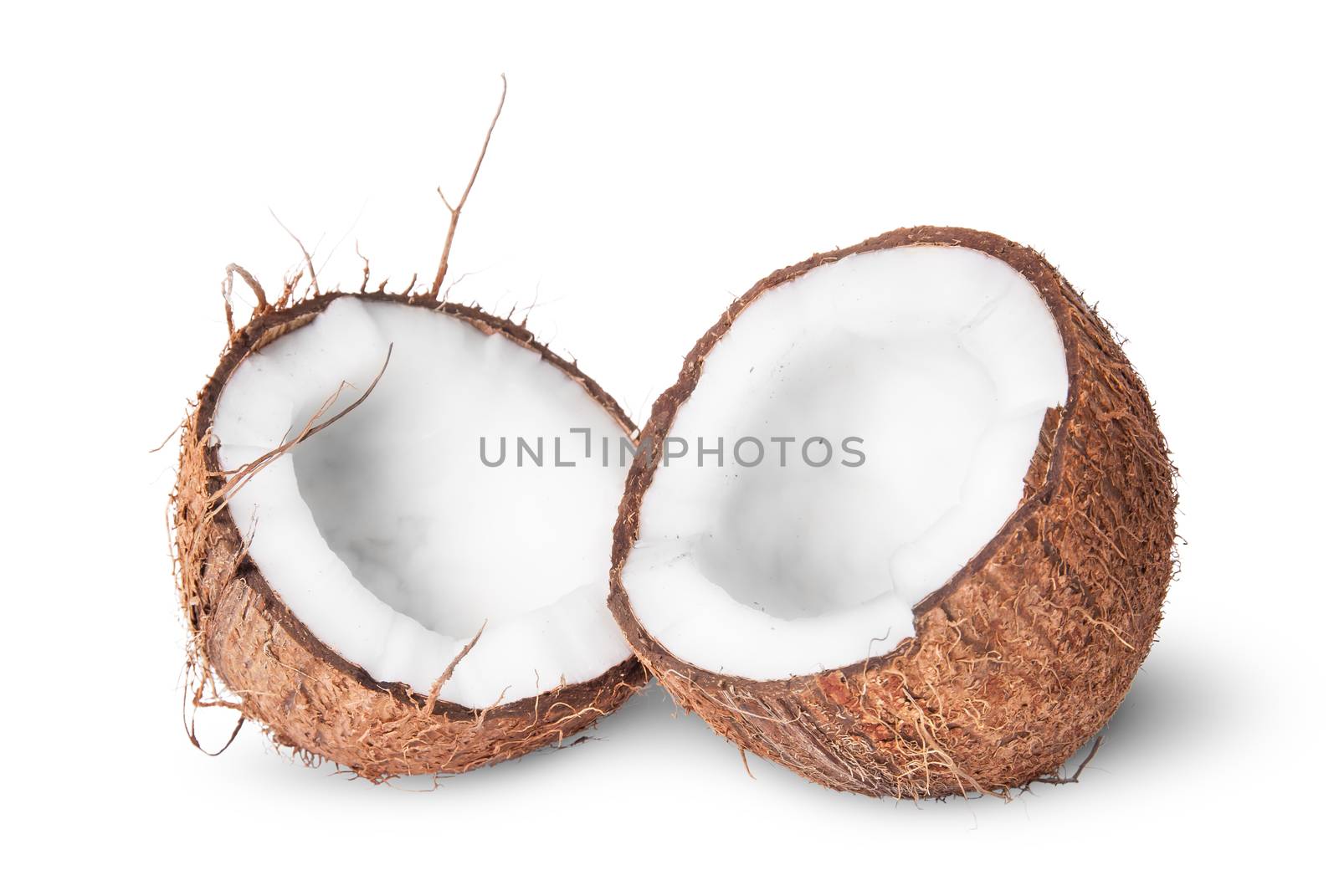 Two halves of coconut isolated on white background