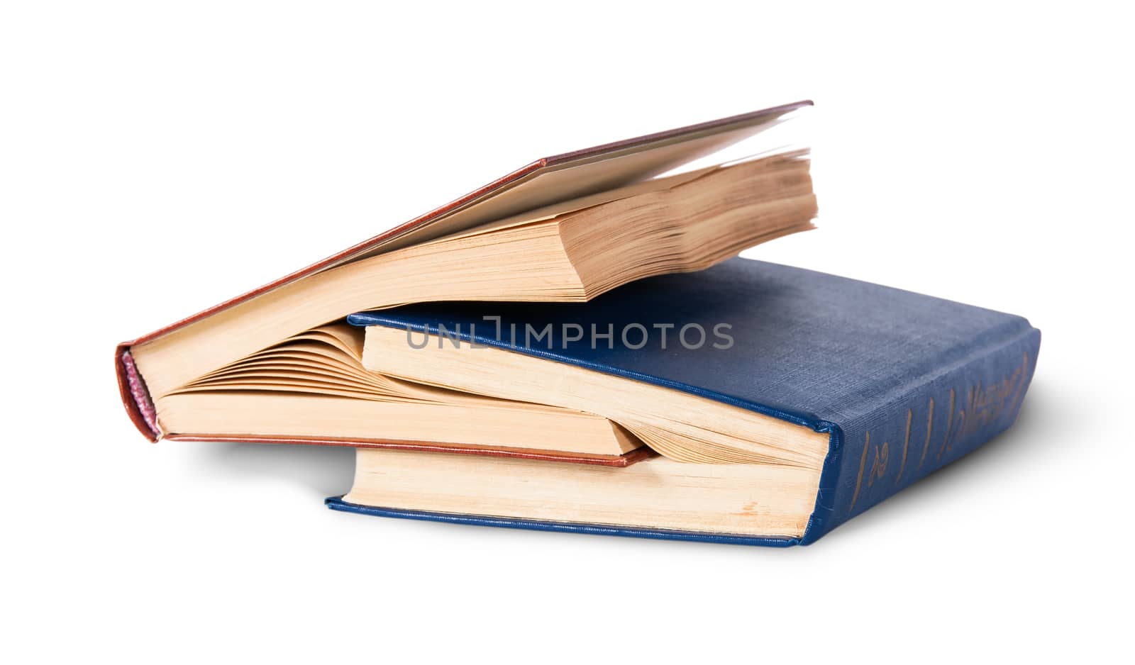 Two old books nested rotated isolated on white background