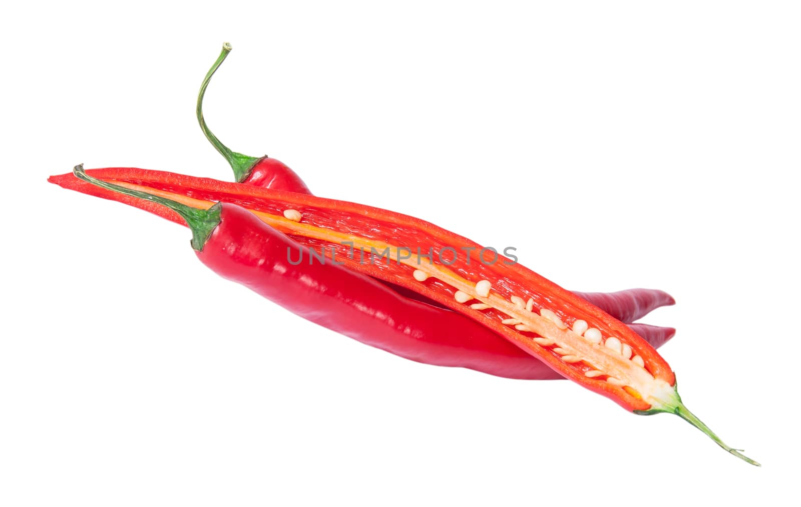 Two whole and one half red chili peppers deployed by Cipariss