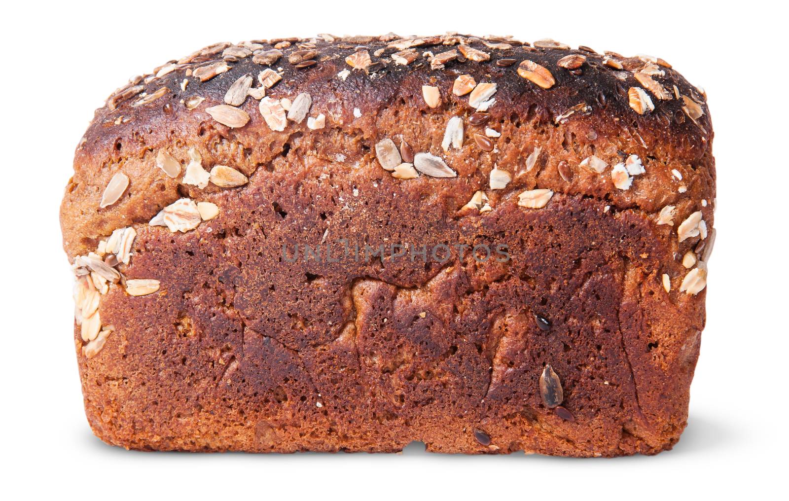 Unleavened of black bread with nuts seeds and dried fruit isolated on white background