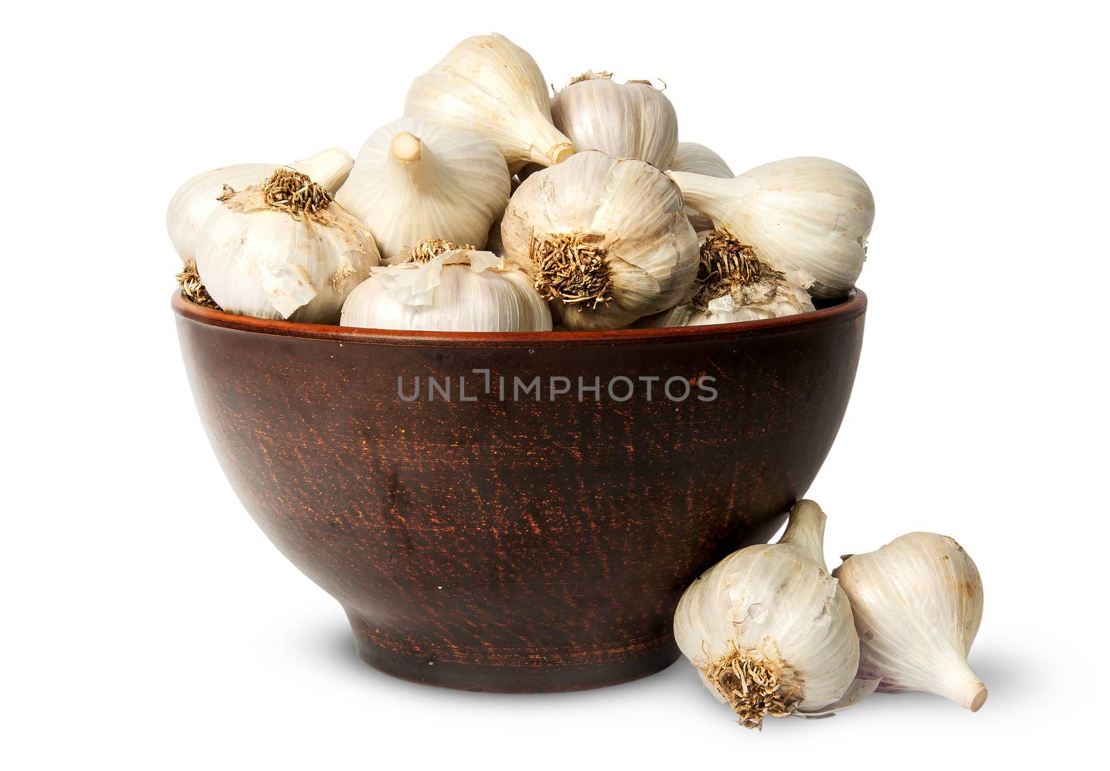 Whole head of garlic in ceramic bowl isolated on white background