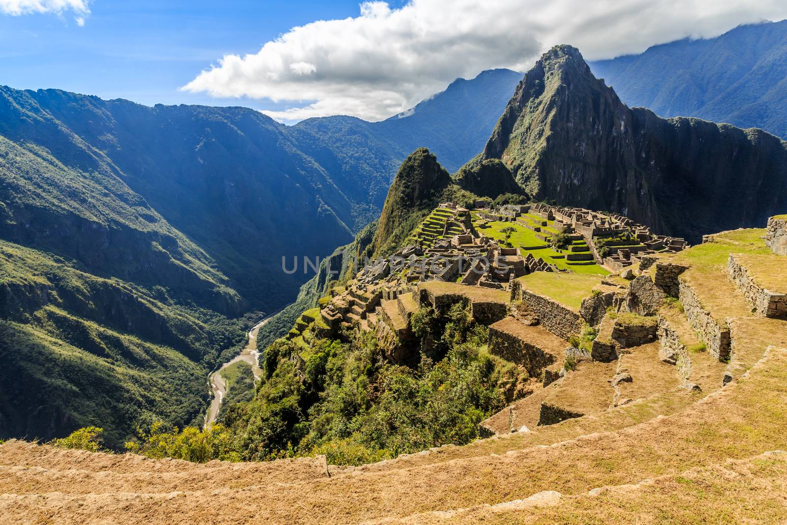 View from the top to old Inca ruins and Wayna Picchu, Machu Picc by ambeon
