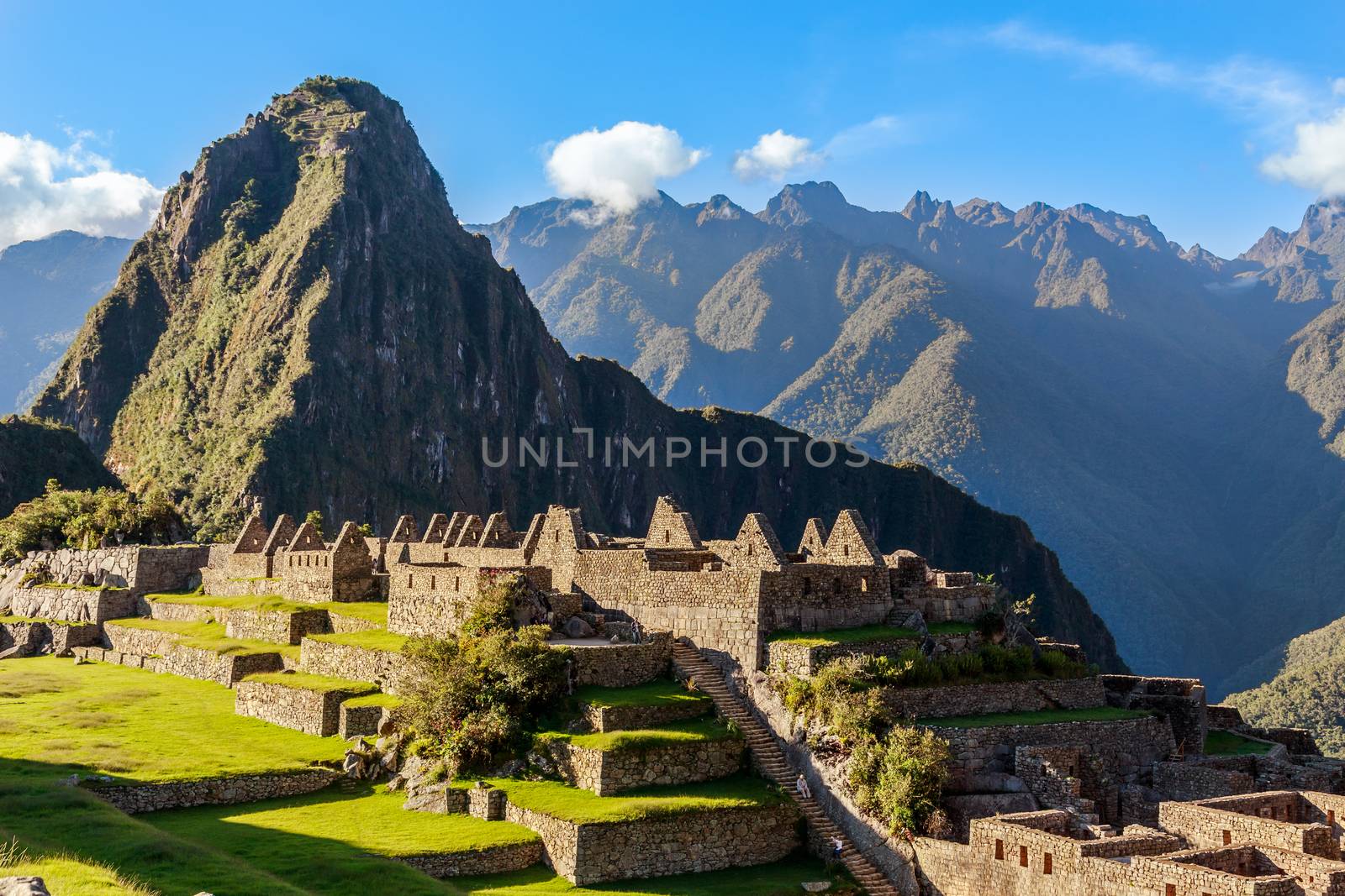 View from the top to old Inca ruins and Wayna Picchu, Machu Picc by ambeon