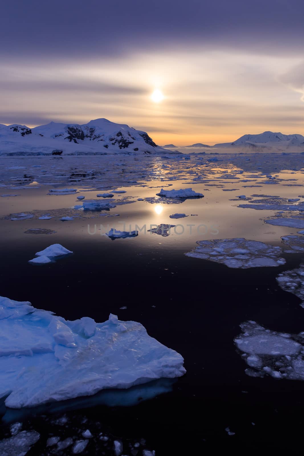 Sunset in the middle of Lemaire Channel, Antarctica