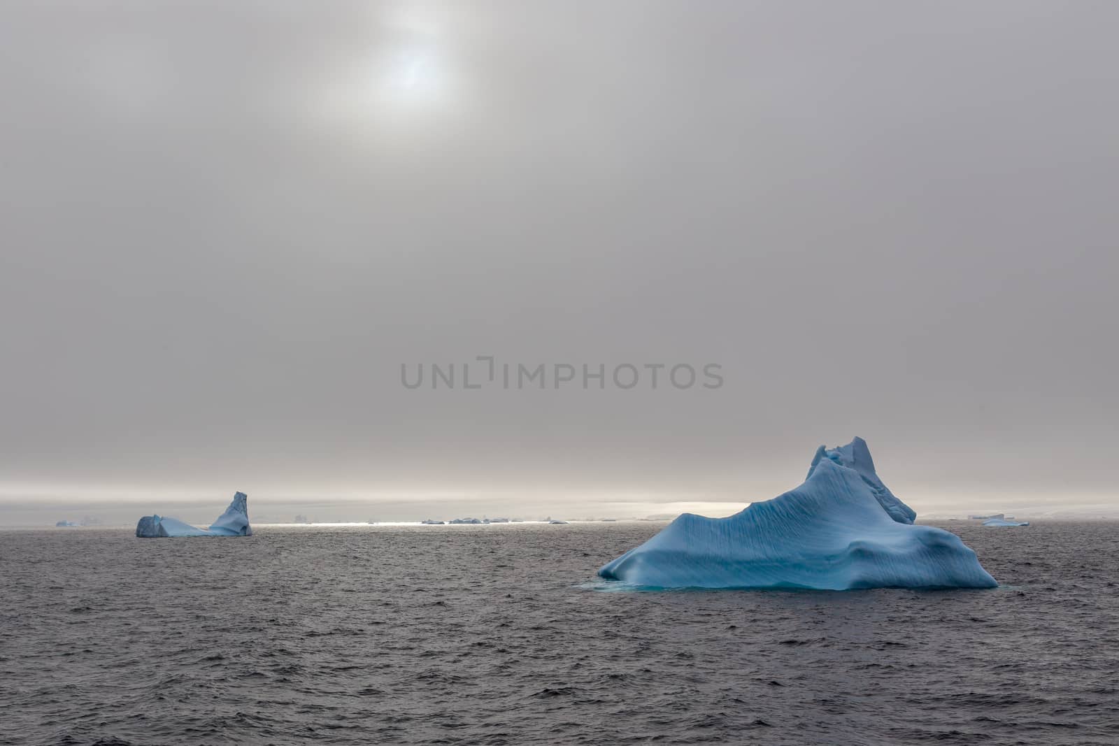 Iceberg drifting at Lemaire Channel, Antarctica by ambeon