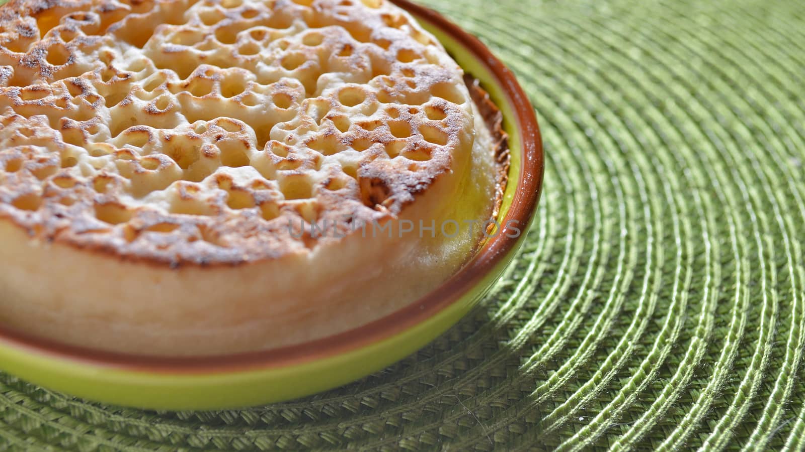 plain crumpet on a plate