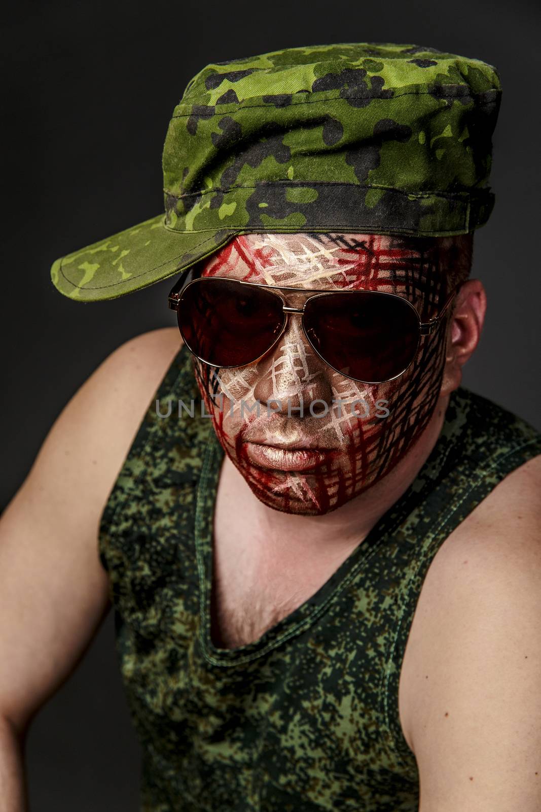 Military Style Camouflage on the Soldier's Face by Multipedia