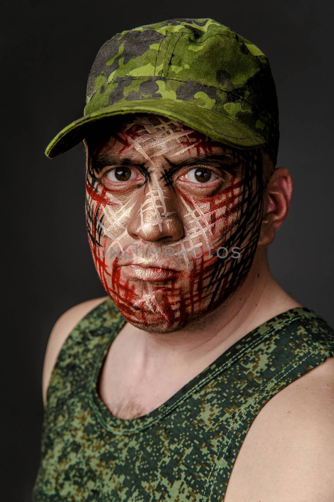 Military Style Camouflage on the Soldier's Face by Multipedia