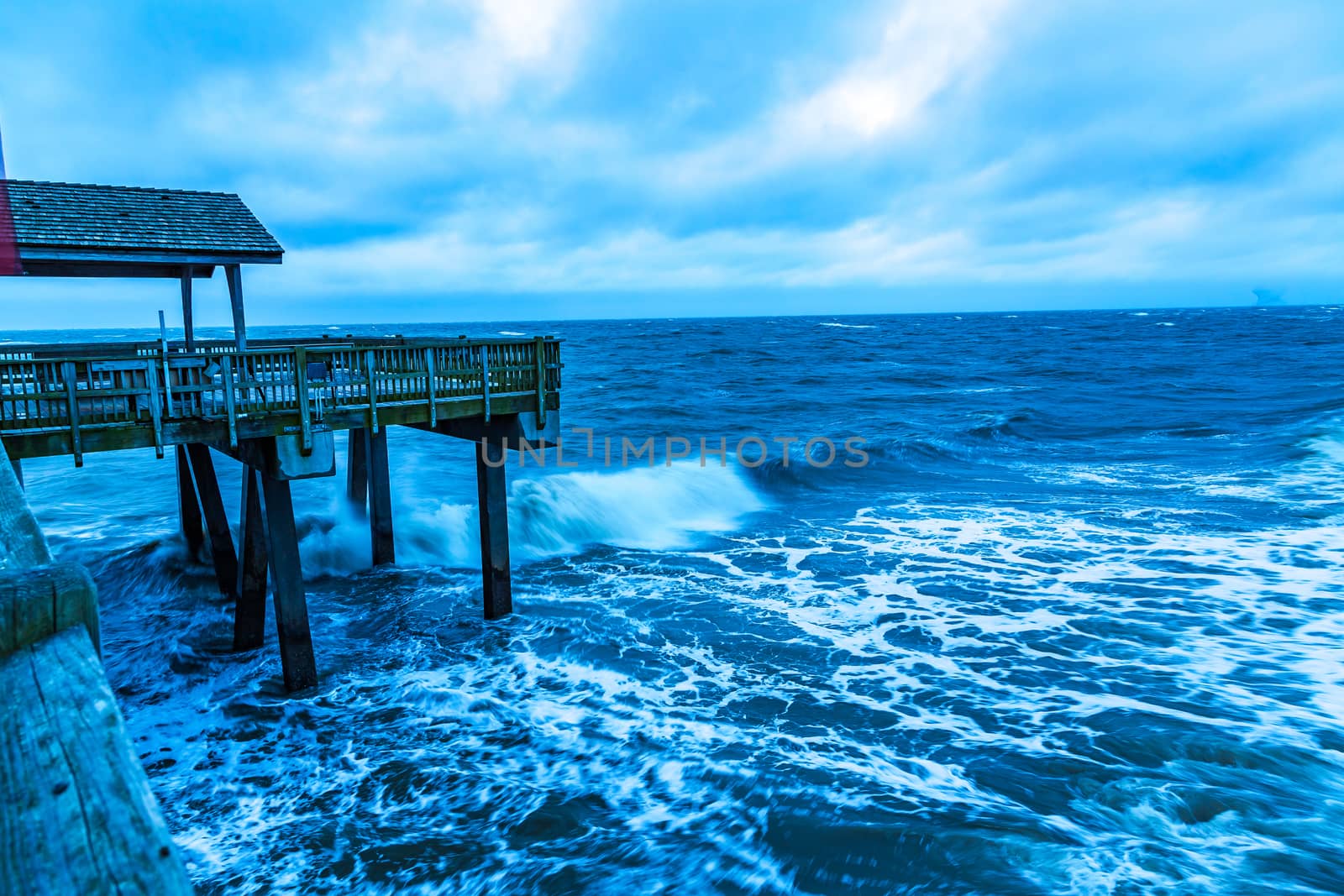 Stormy Morning at the Pier by adifferentbrian