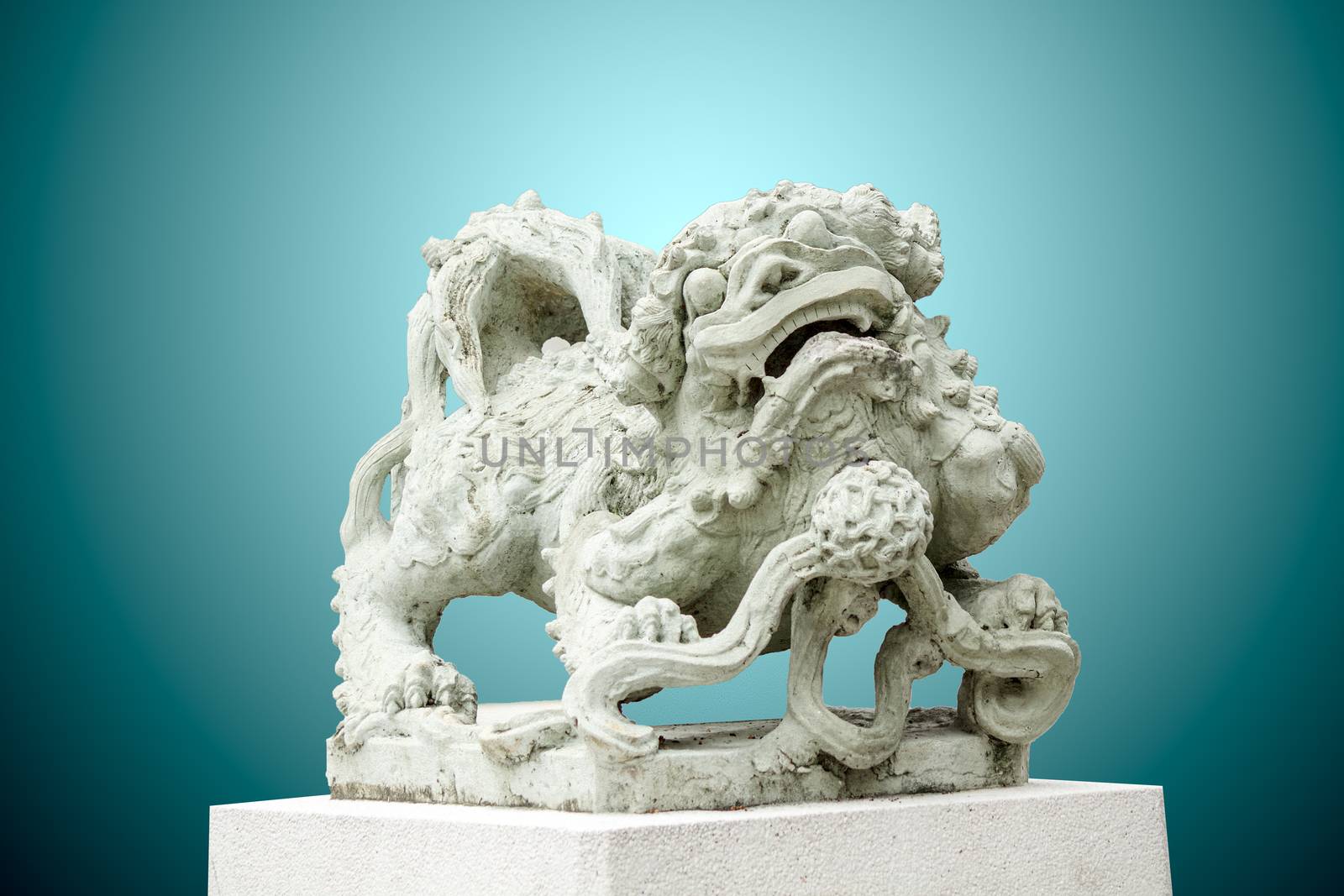 Sculpture of Chinese lion, Antique traditional stone carving doll with gradient background