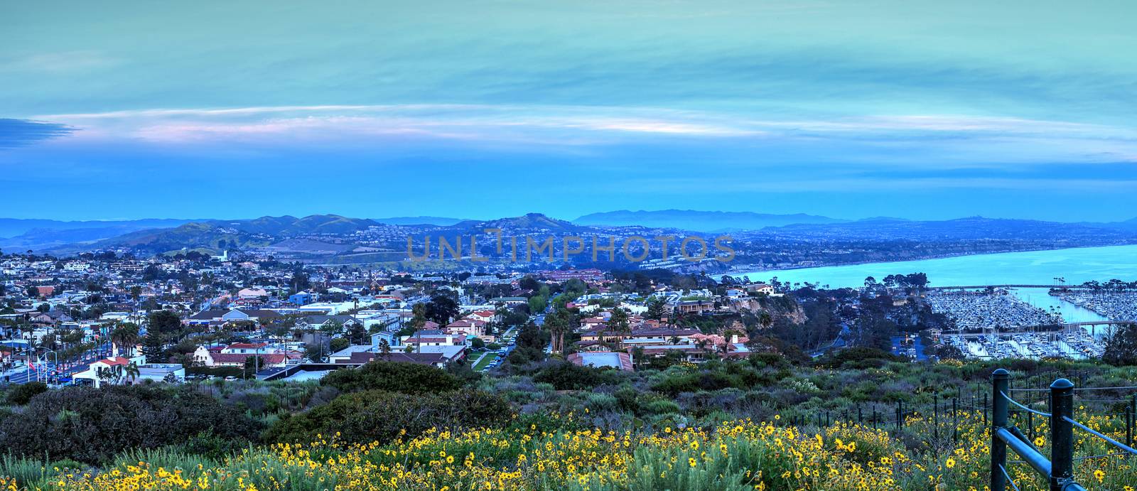 Hiking trail above Dana Point harbor at sunset in Southern California, USA