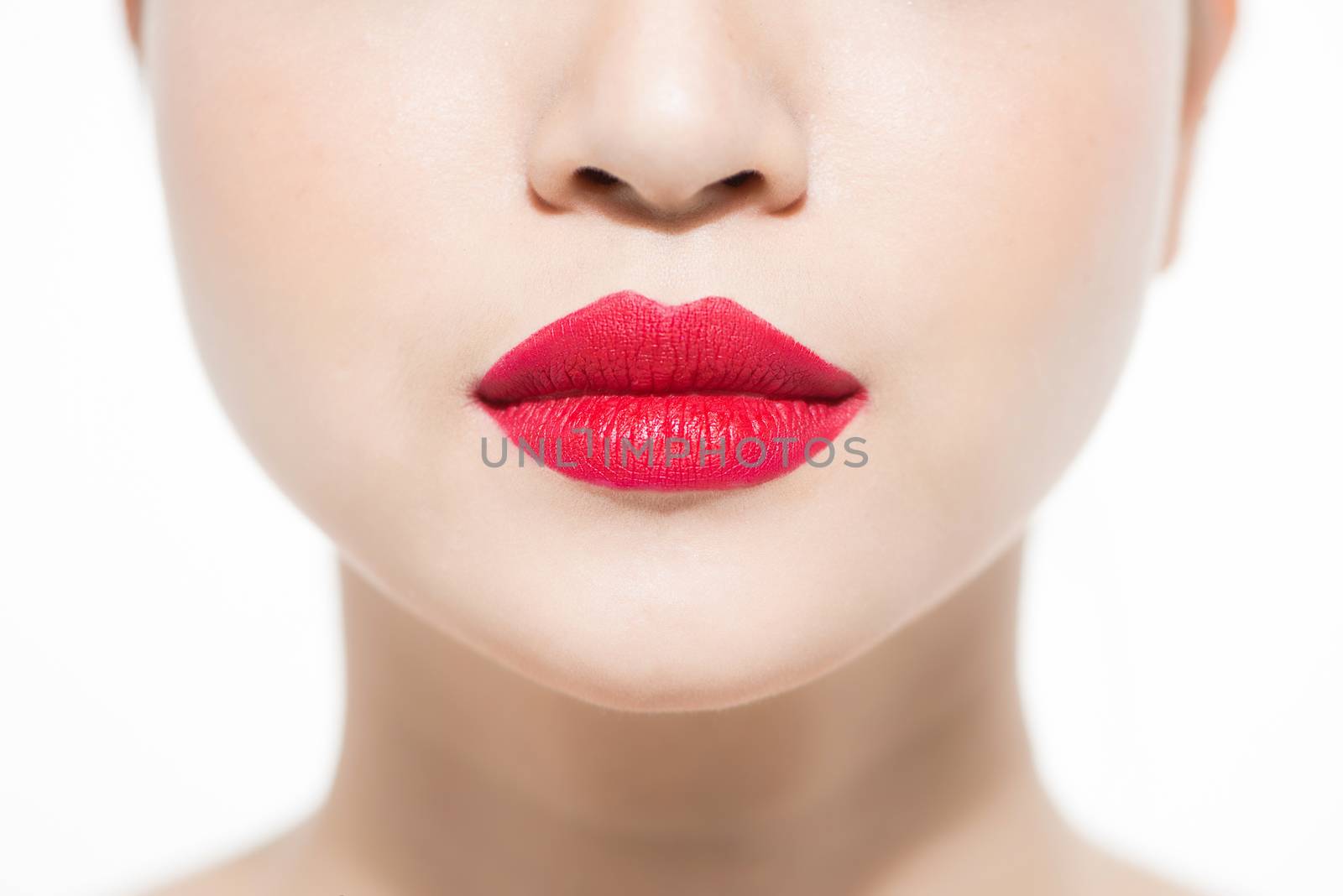 closeup portrait of young woman's lips zone make up by makidotvn
