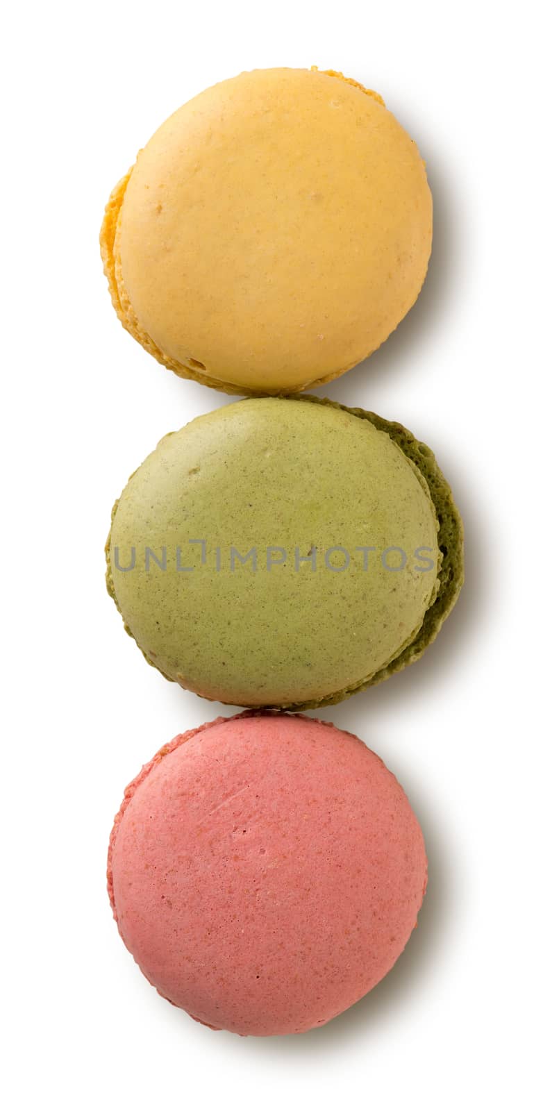 Caramel macarons isolated on a white background