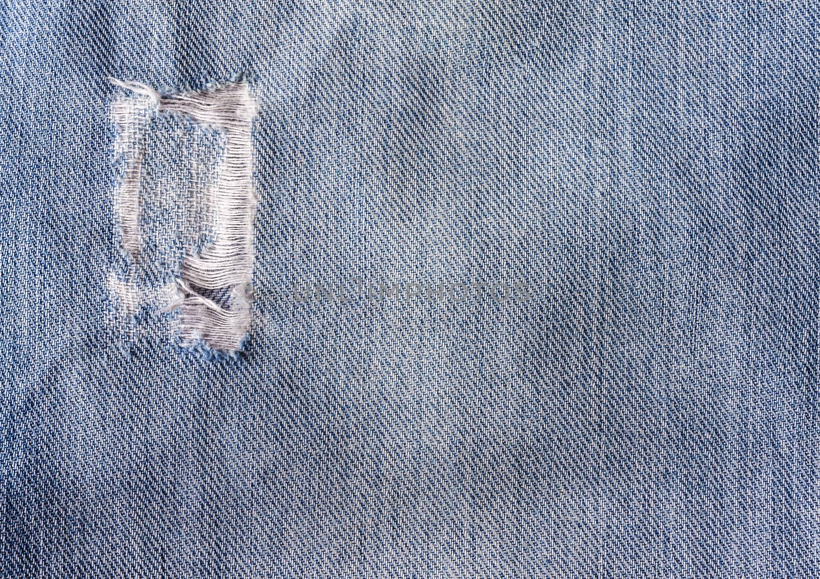 Jeans close-up, texture, torn, mopped pieces