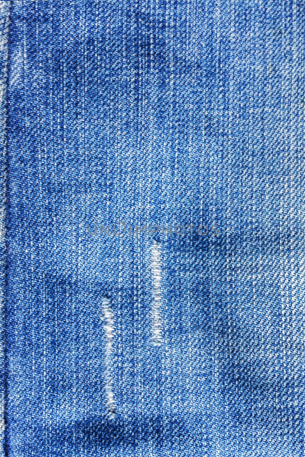 Jeans close-up, texture, torn, mopped pieces. by Tanacha