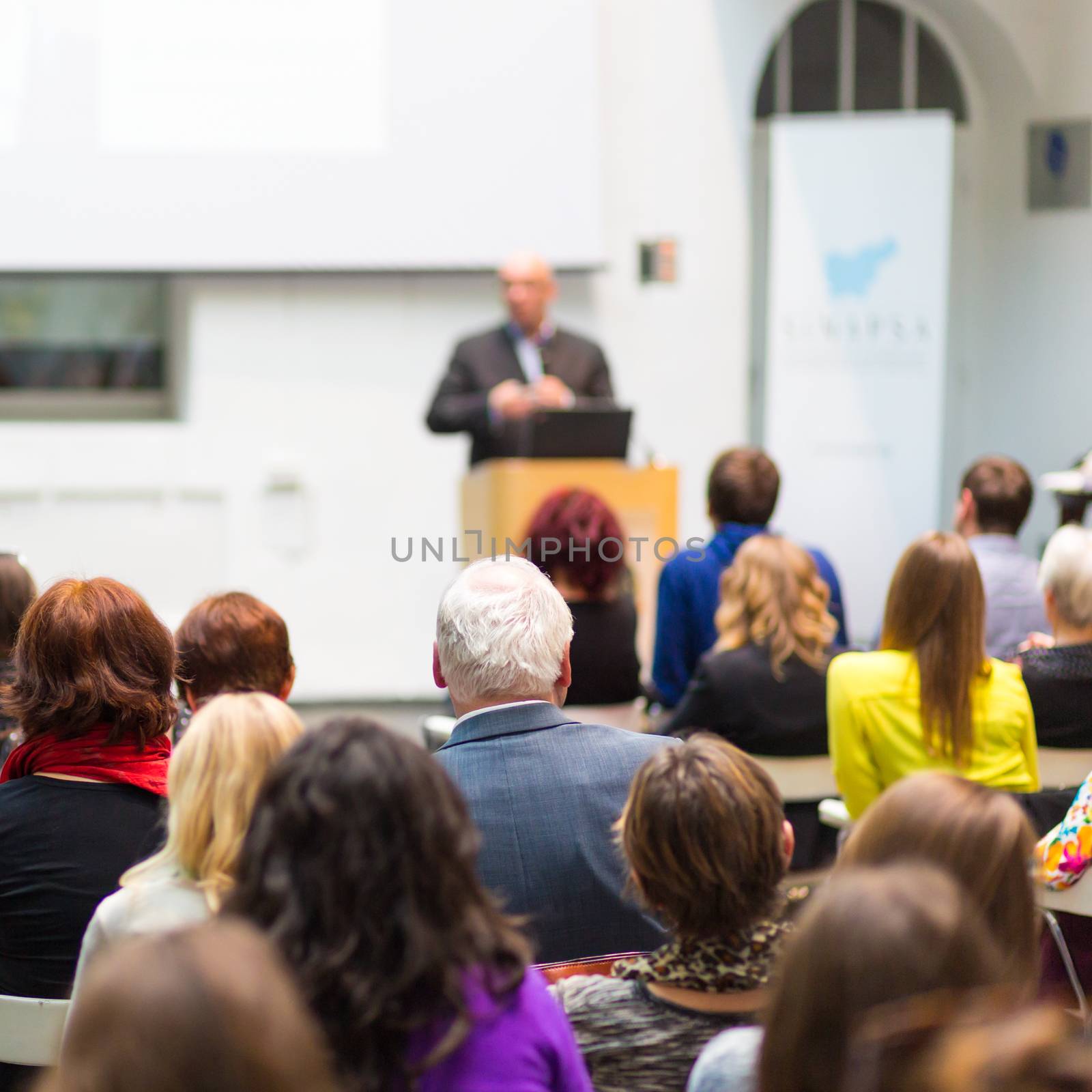 Audience in the lecture hall. by kasto