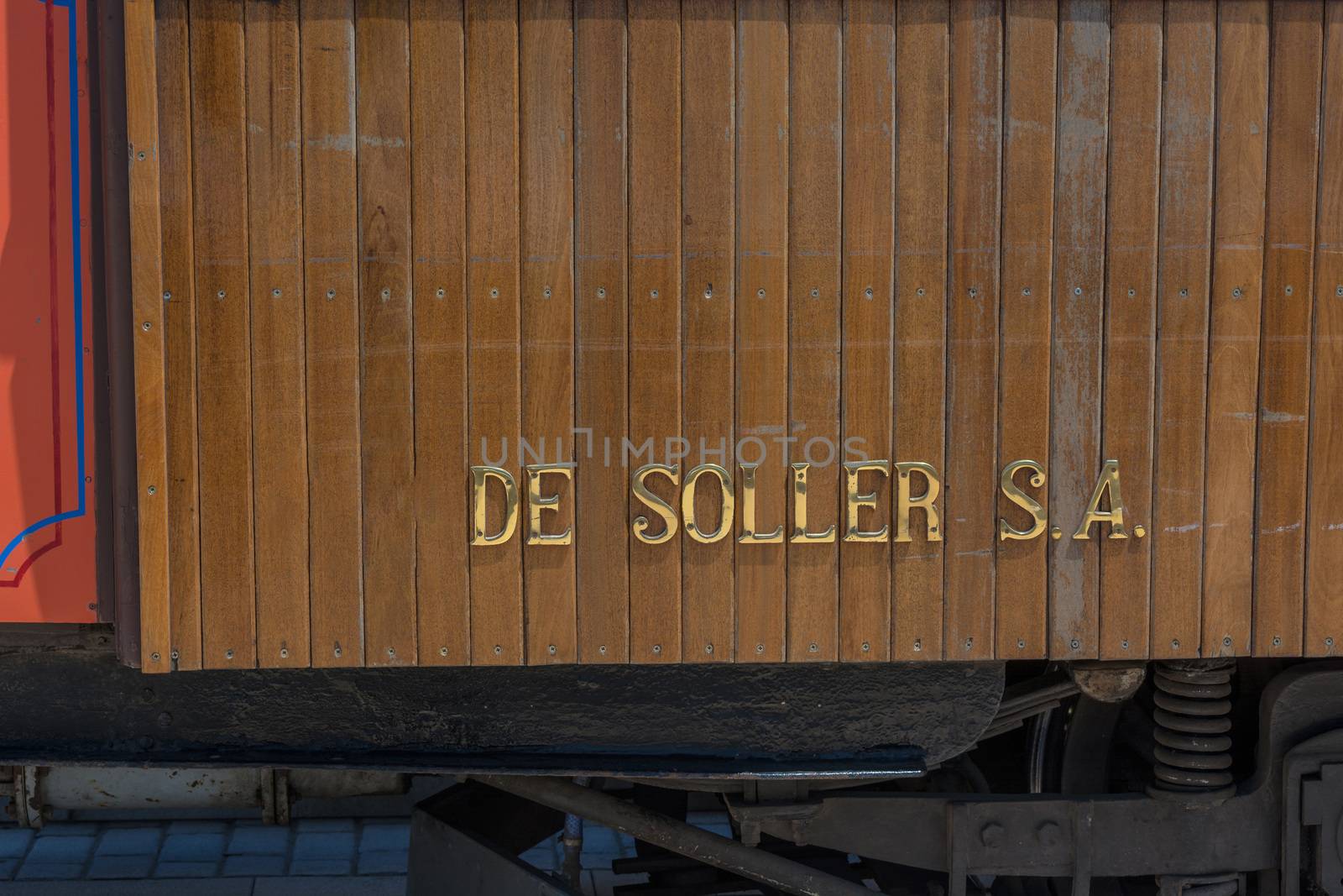 Lettering the vintage train, tram on the beach promenade of the town of Soller in Spain.