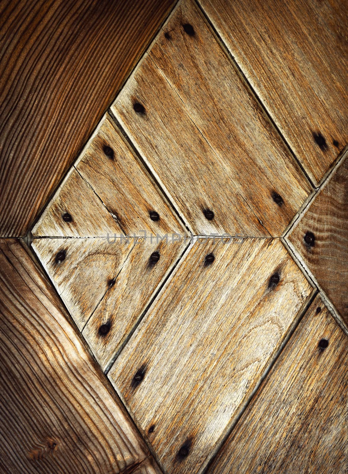 detail pattern on old wooden door by Ahojdoma