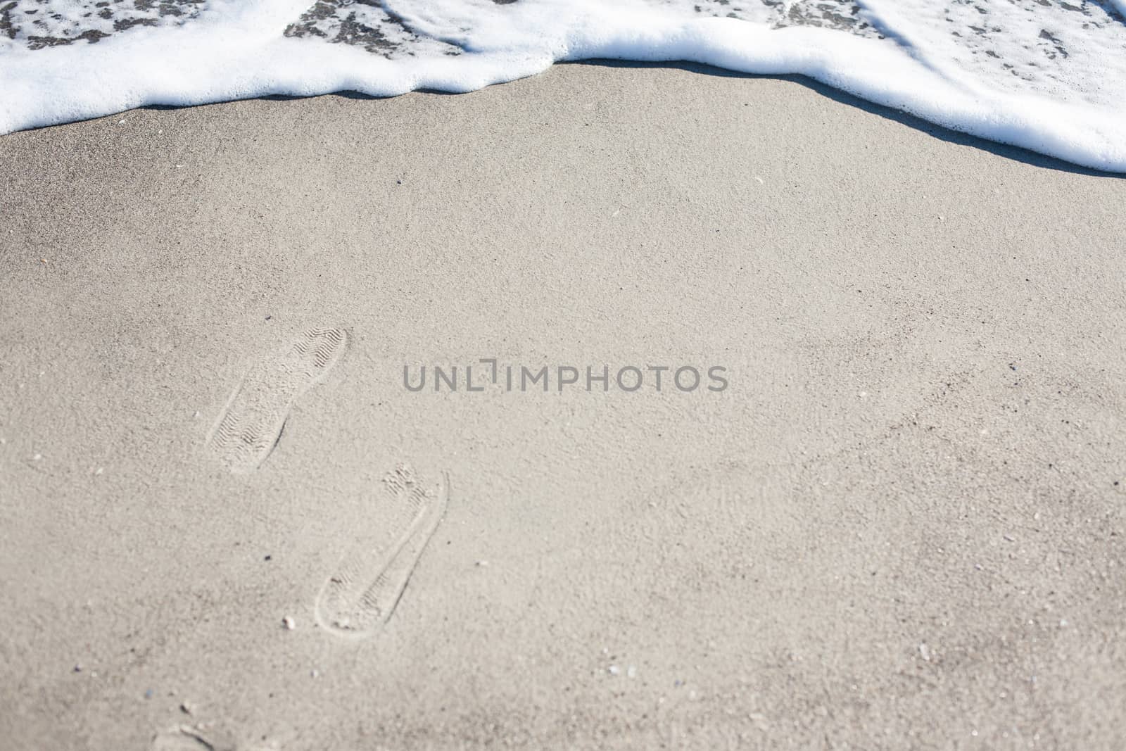 Soft wave of Black sea on sandy beach. Nature Background