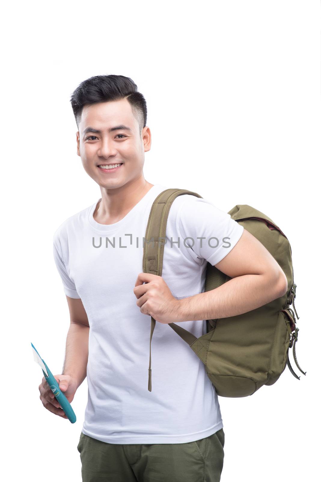 Travel concept. Studio portrait of handsome young man with backp by makidotvn