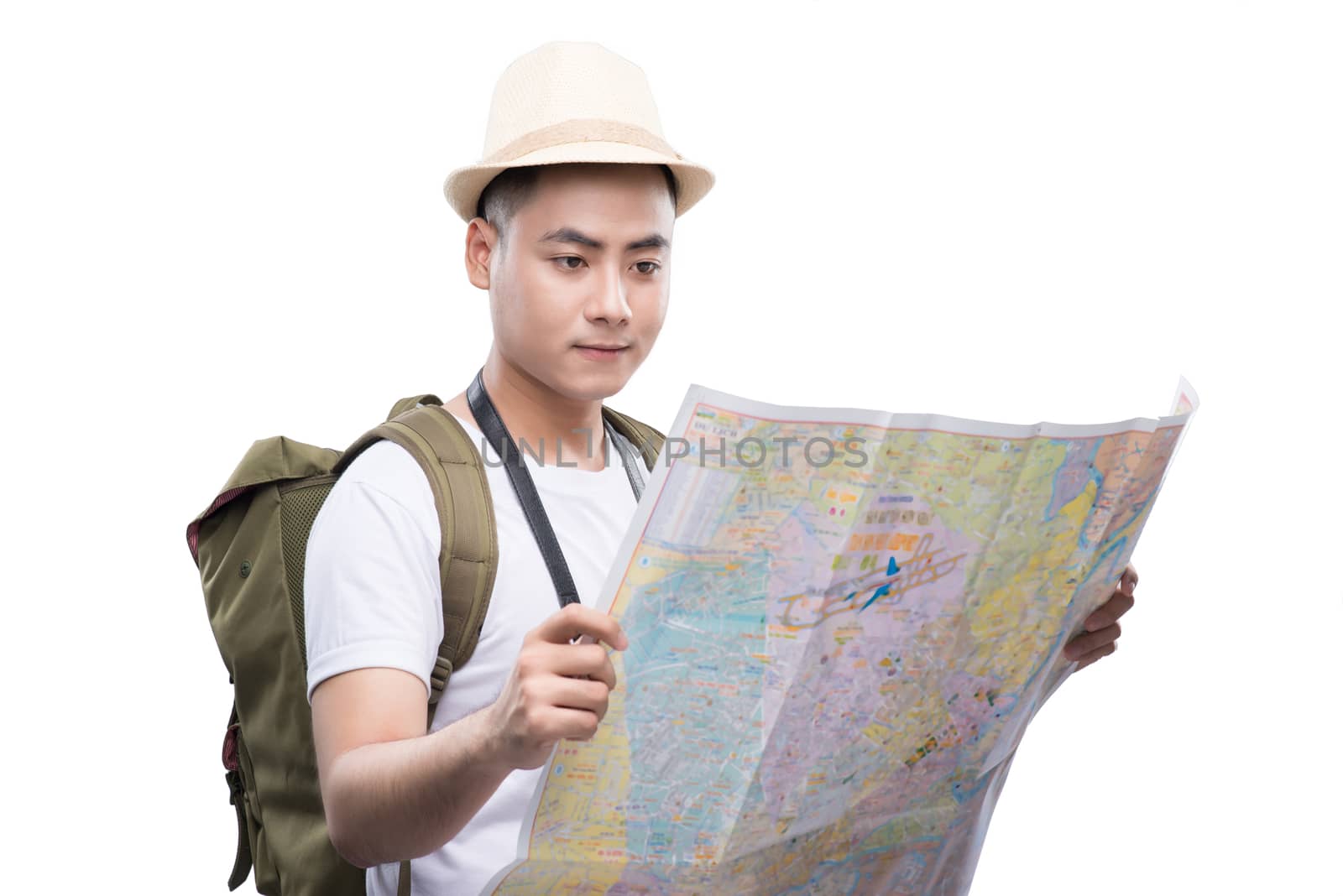 Travel concept. Studio portrait of handsome young man with backpack. Isolated on white.