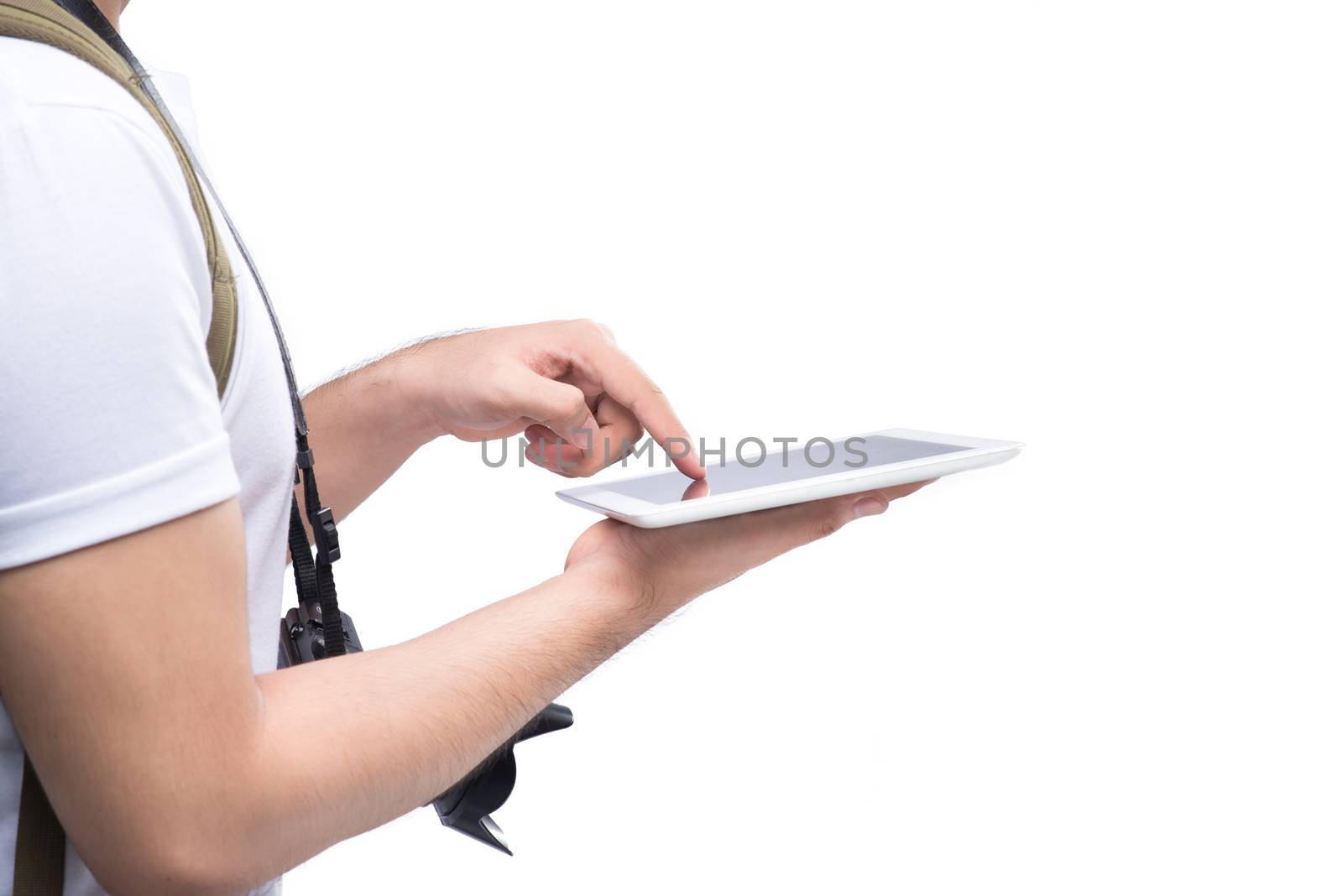Hands of young traveler using tablet pc