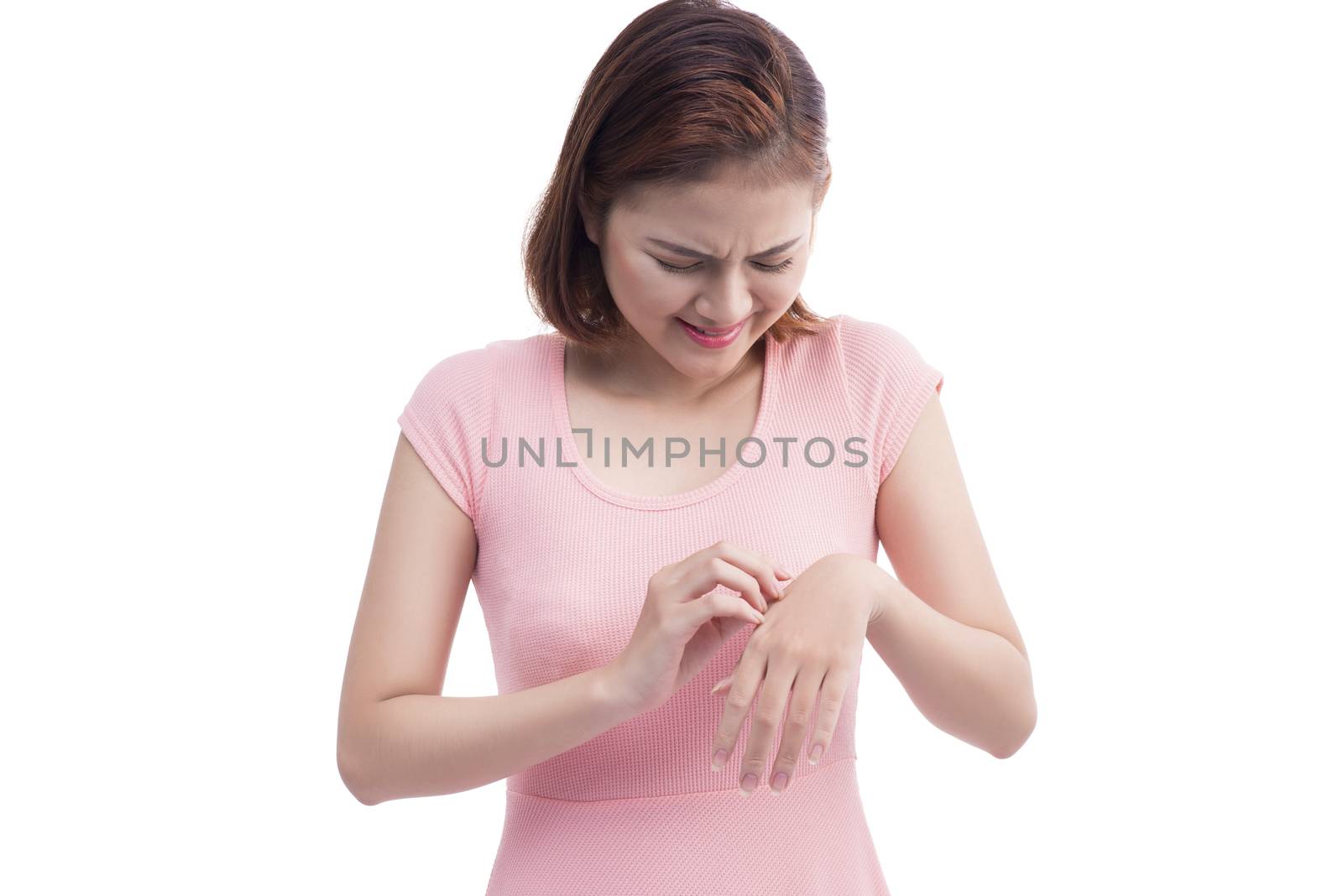 Close up view of female hands with wrist pain. Isolated on white.