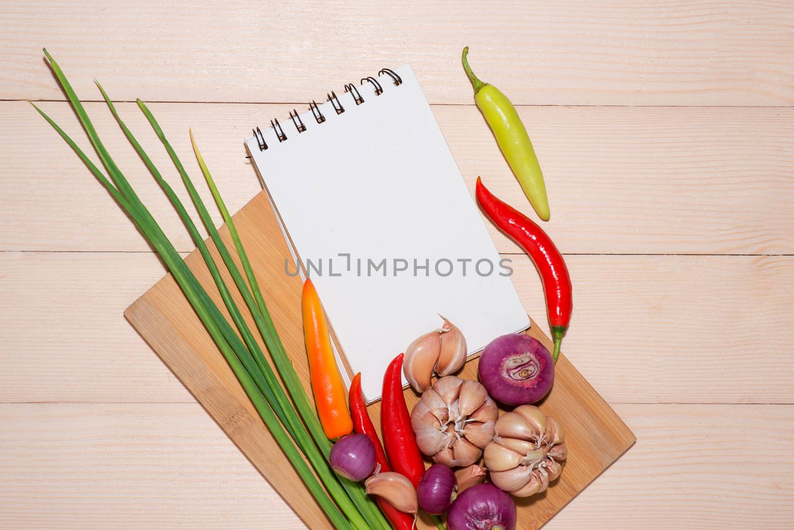 Notebook for culinary recipes with fresh organic vegetables by makidotvn