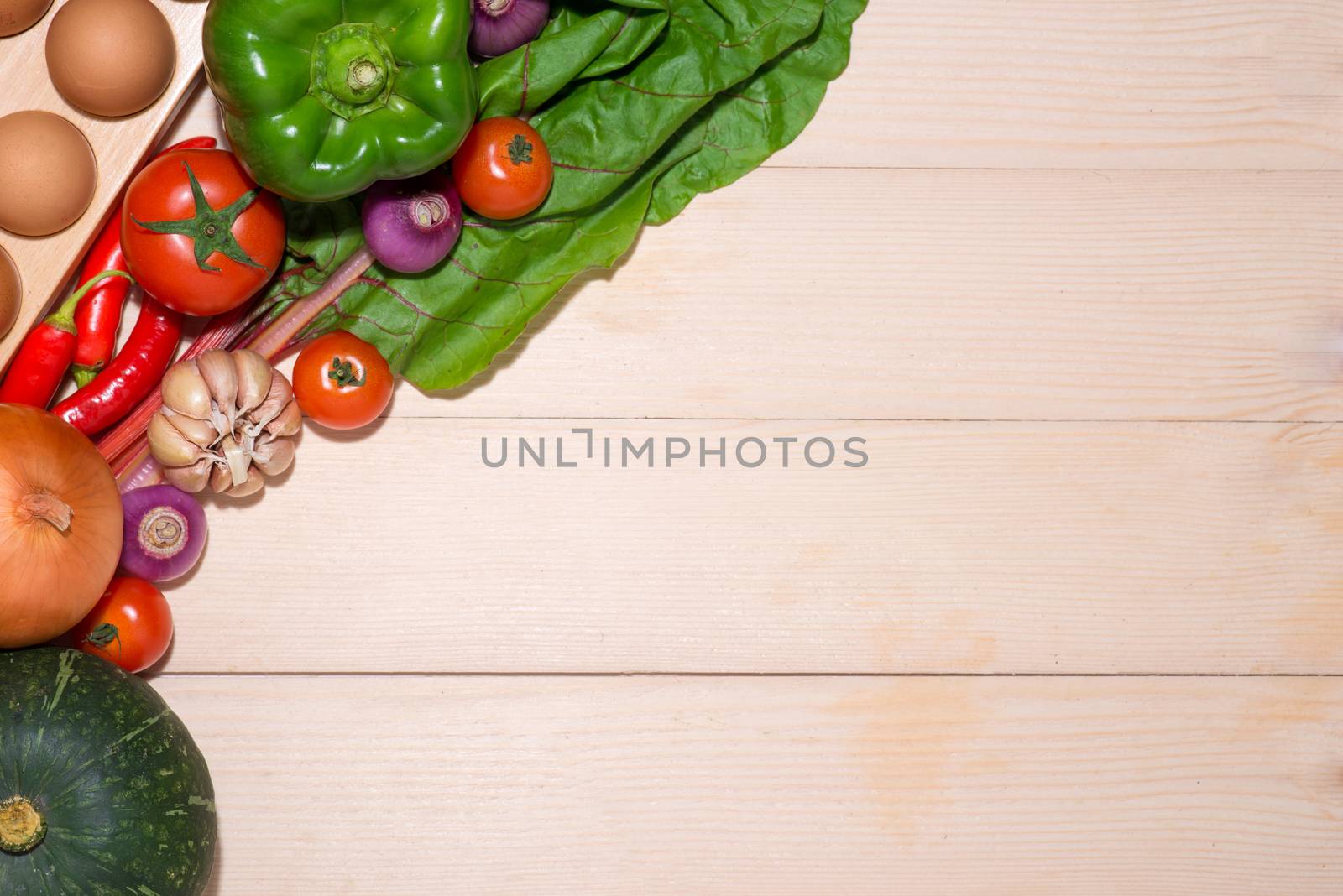 Notebook for culinary recipes with fresh organic vegetables