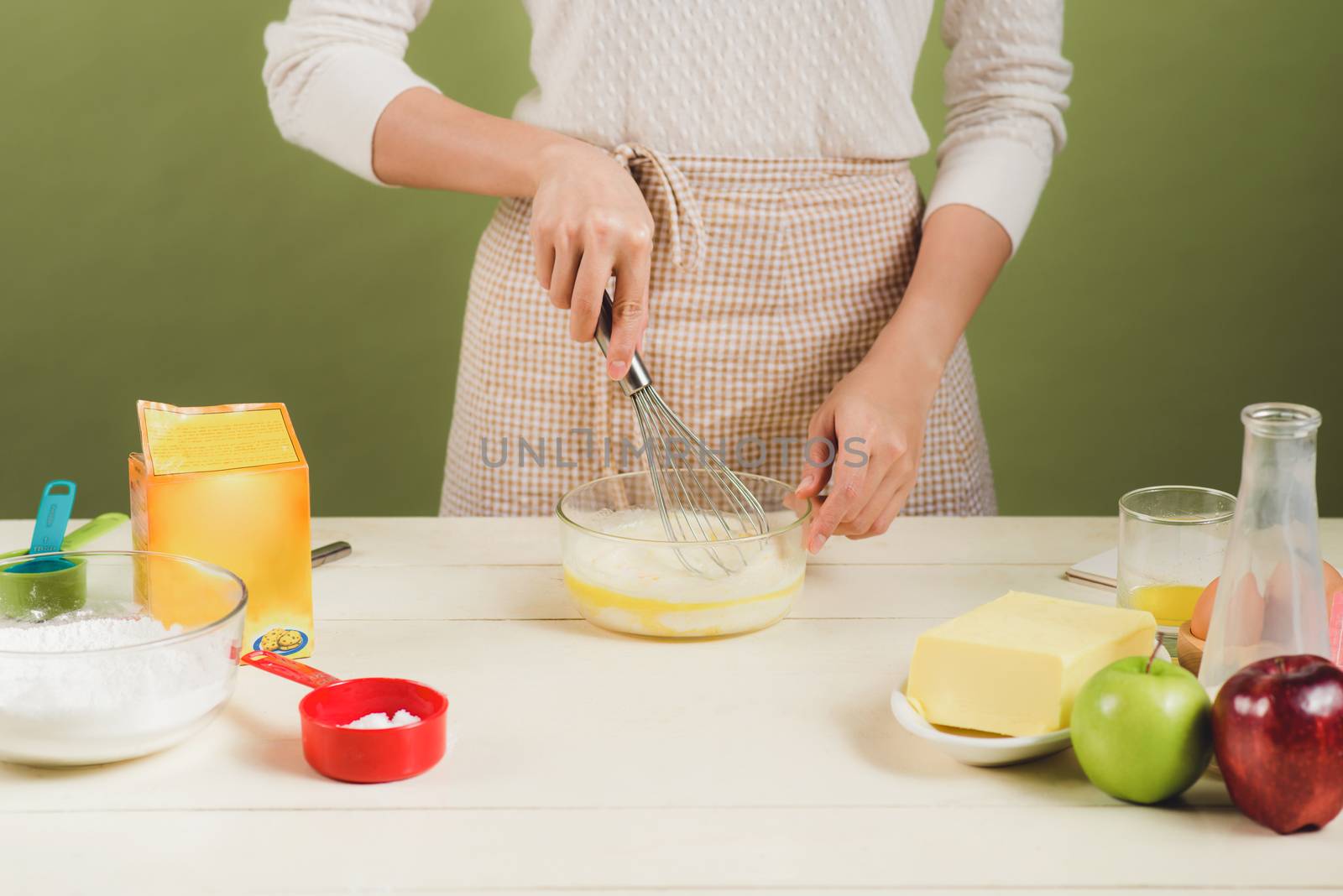 House wife wearing apron making. Steps of making cooking pancake.