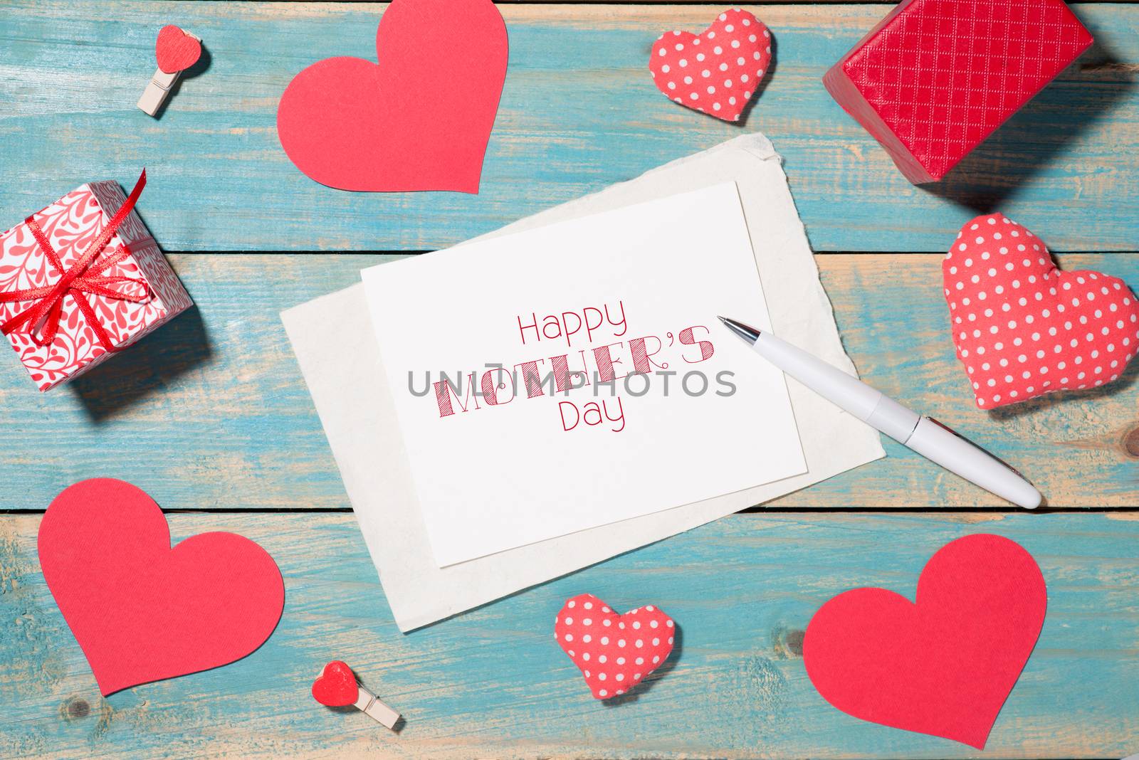 Valentine's Day greeting card over wooden background. Top view w by makidotvn