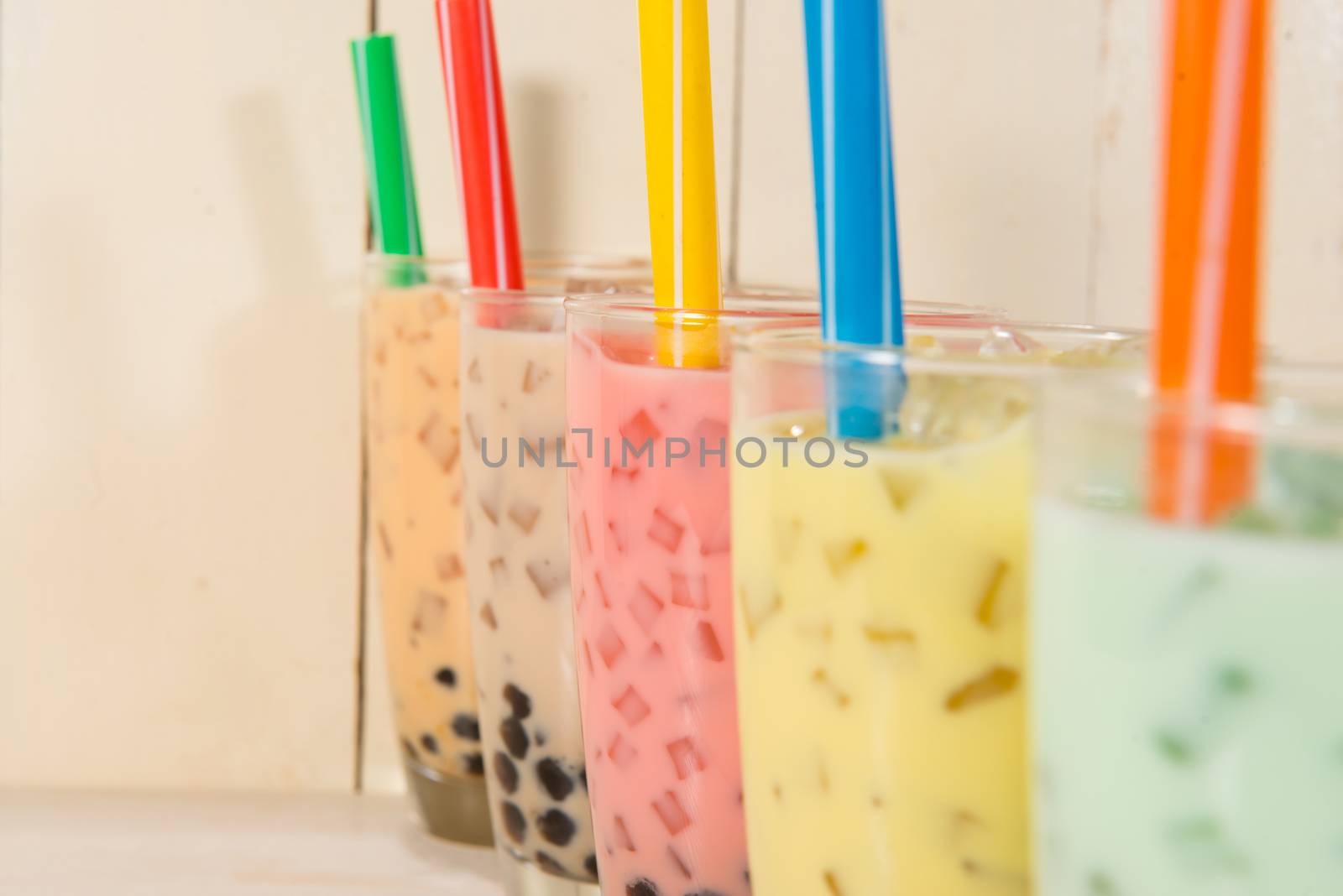 Boba / Bubble tea. Homemade Various Milk Tea with Pearls on wood by makidotvn