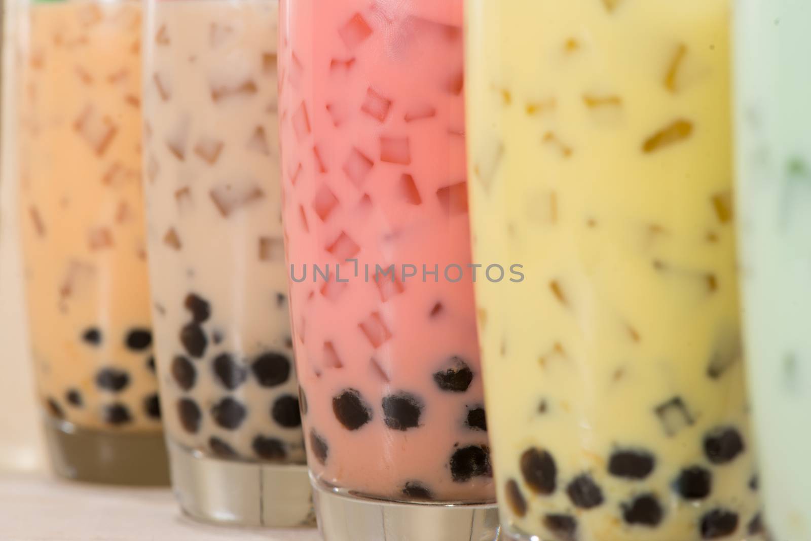Boba / Bubble tea. Homemade Various Milk Tea with Pearls on wood by makidotvn