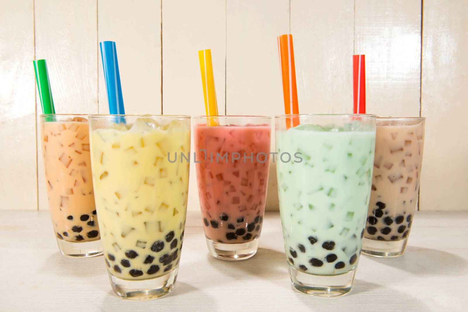 Boba / Bubble tea. Homemade Various Milk Tea with Pearls on wood by makidotvn