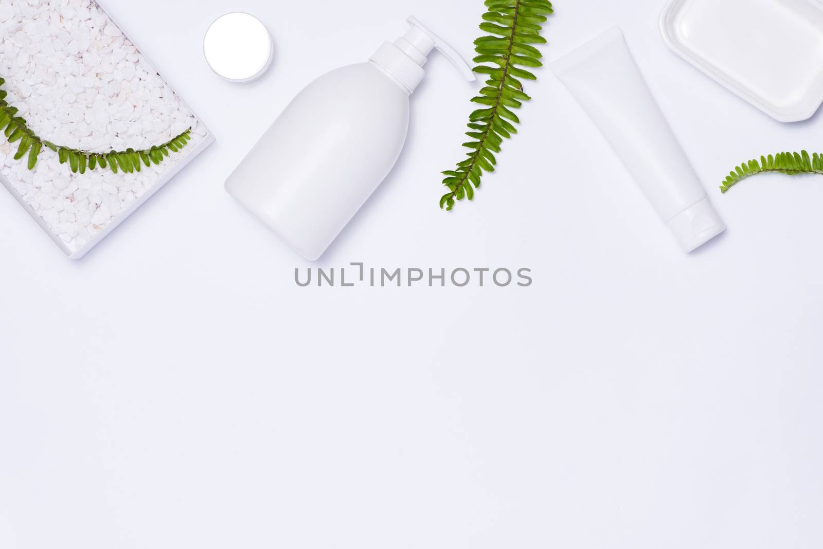 Cosmetics SPA branding mock-up, top view, on white background. by makidotvn