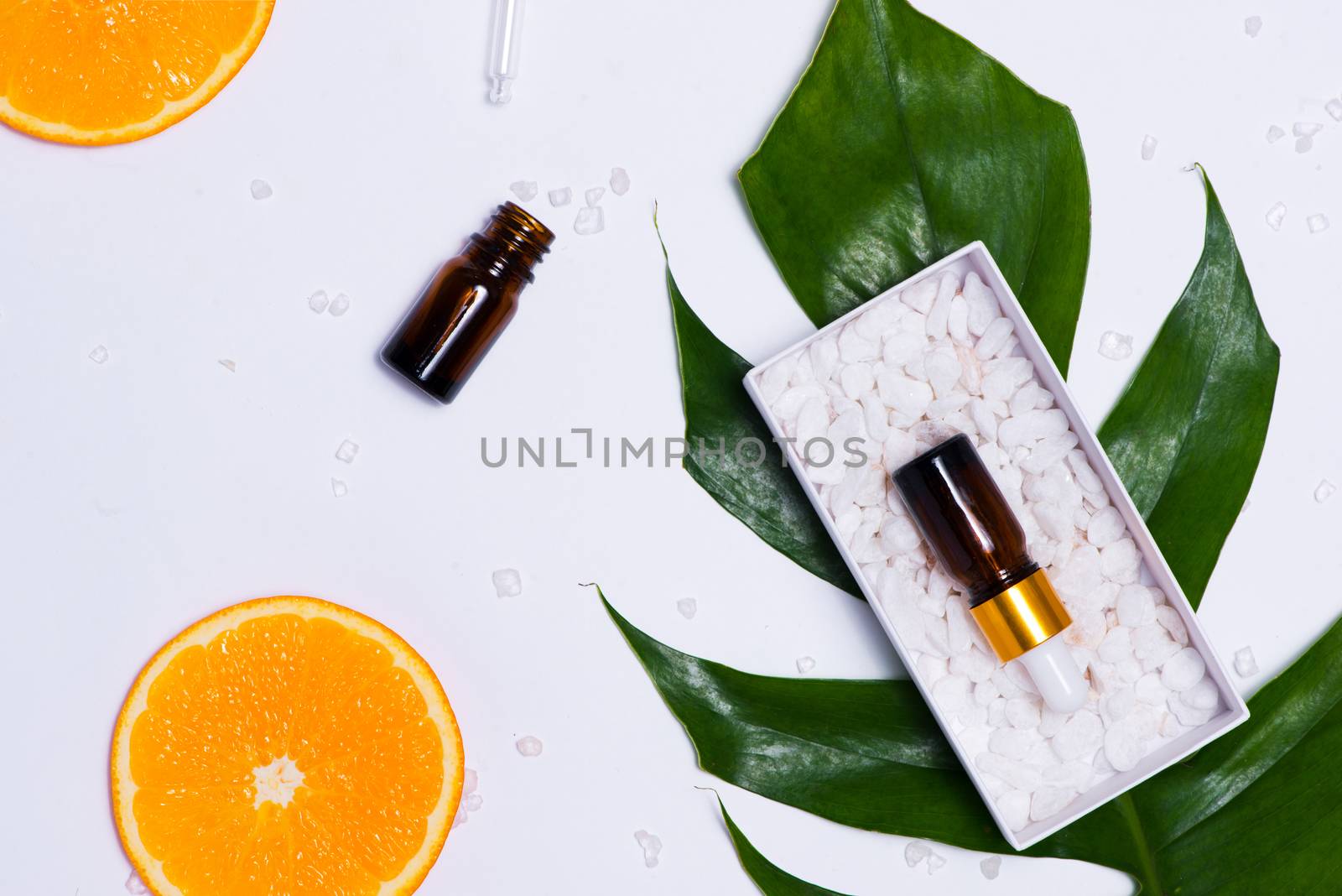 Branding mock-up. Natural essential oil, Cosmetic bottle contain by makidotvn